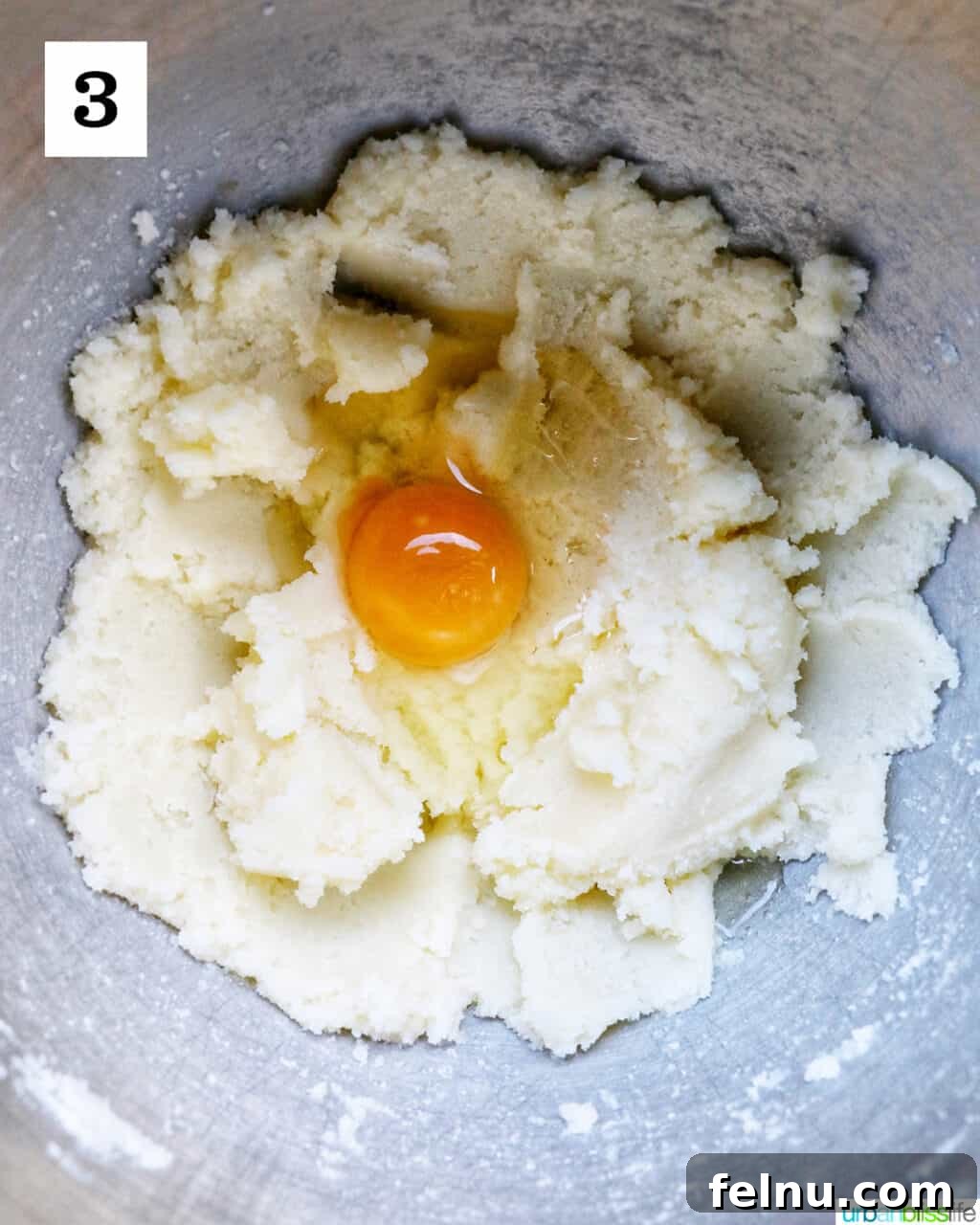 Adding Egg to Mixture