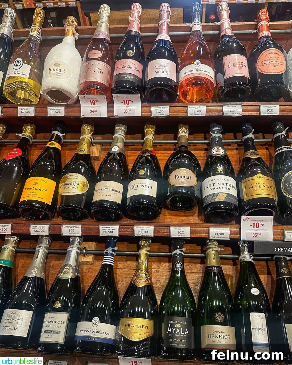 Paul Bocuse Lyon Food Hall 9 close up of wine bottles at les halles food market in Lyon, France