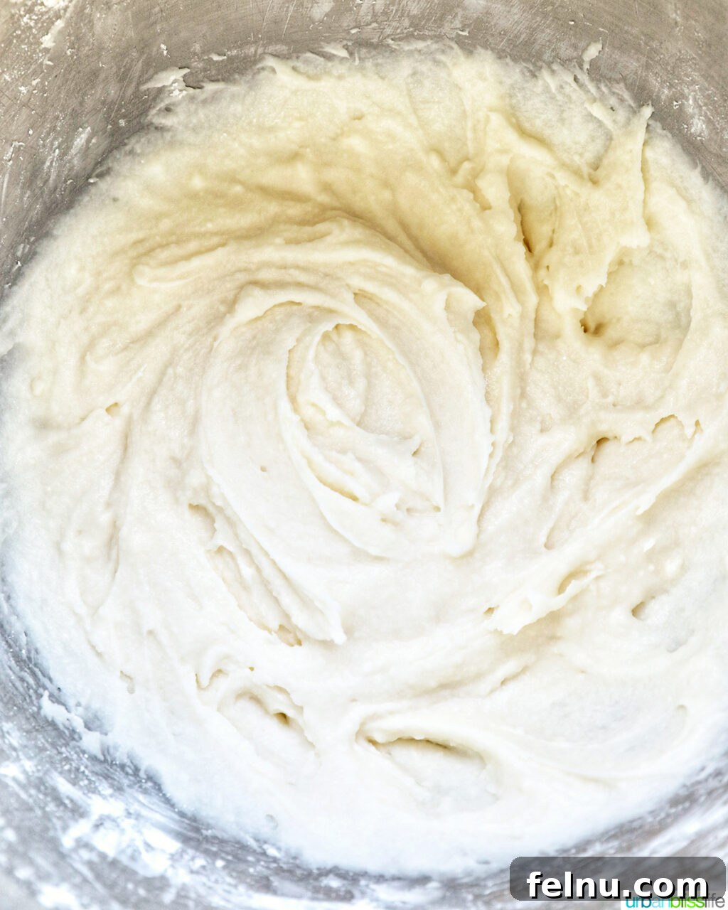 Touchdown Treats 8 Vanilla buttercream frosting ingredients in a stand mixing bowl, ready to be mixed.