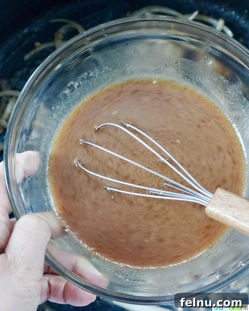 Savory Beef and Onion Skillet 12 Whisking stir fry sauce