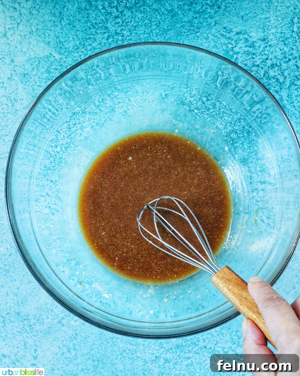 Savory Beef and Onion Skillet 5 Whisking the stir-fry sauce