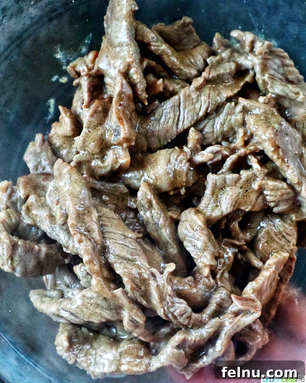 Savory Beef and Onion Skillet 9 Cooking sliced beef in a pan