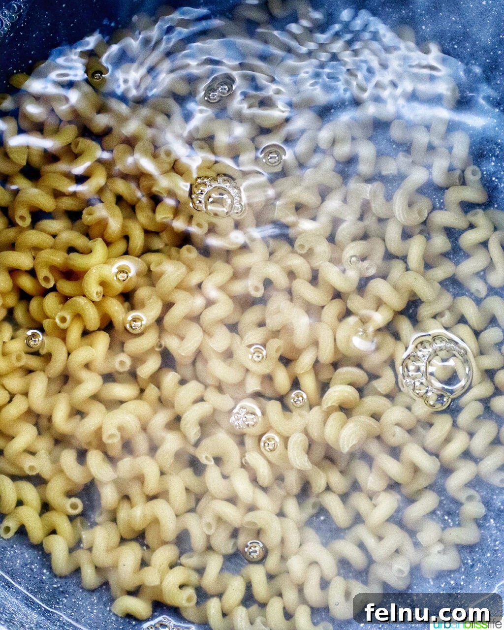 Bacon Pesto Pasta Delight 5 Pasta cooking in boiling water