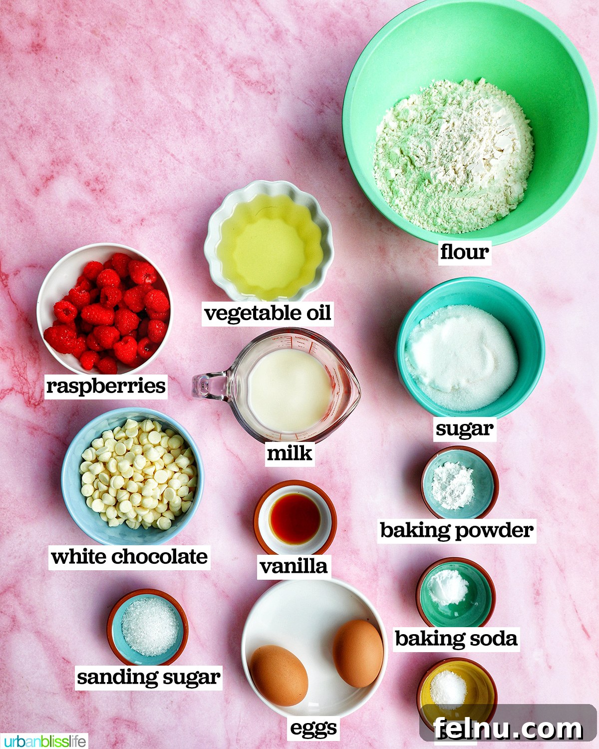 bowls of ingredients to make raspberry white chocolate chip muffins