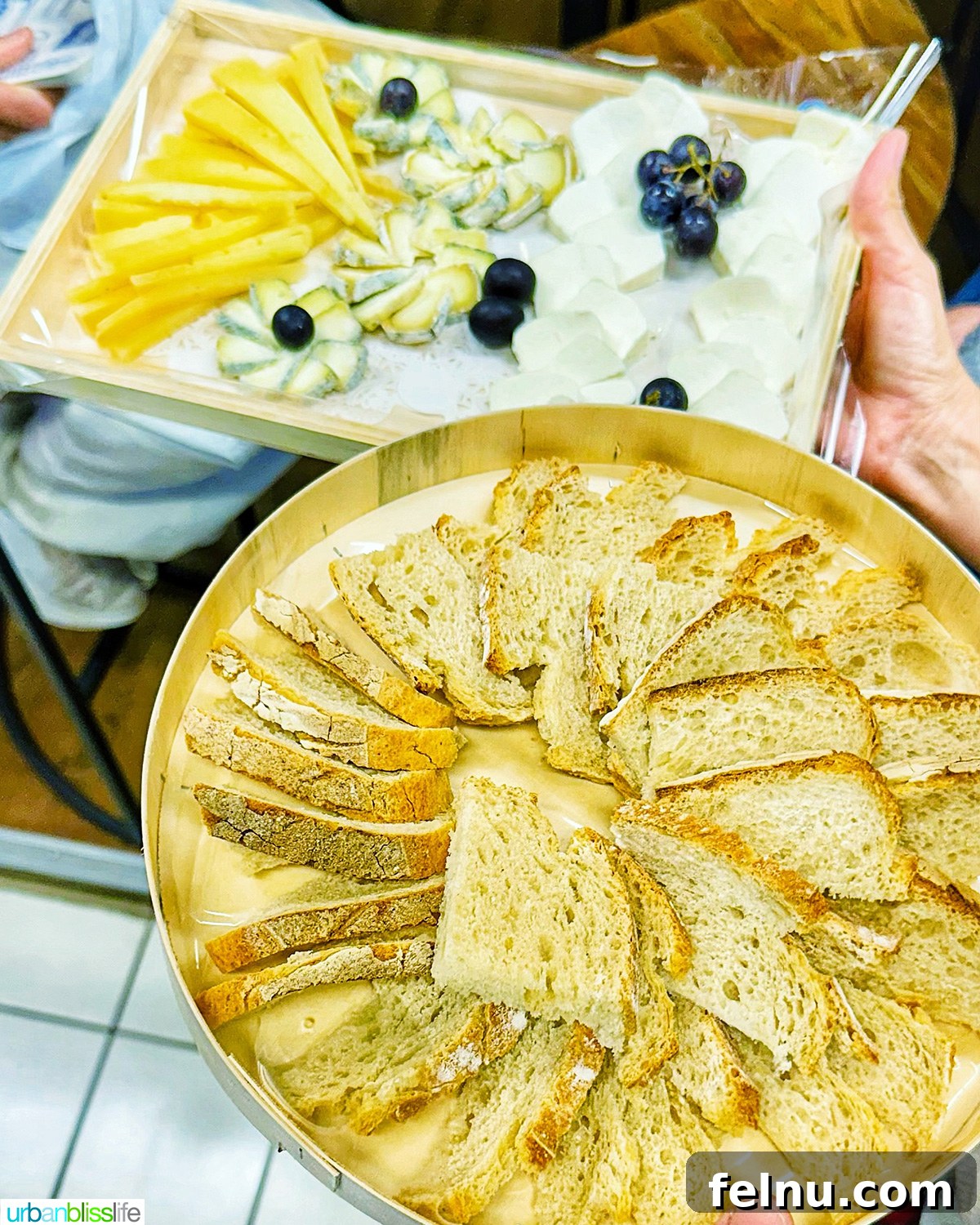 Cheese and bread slices at Les Halles Avignon