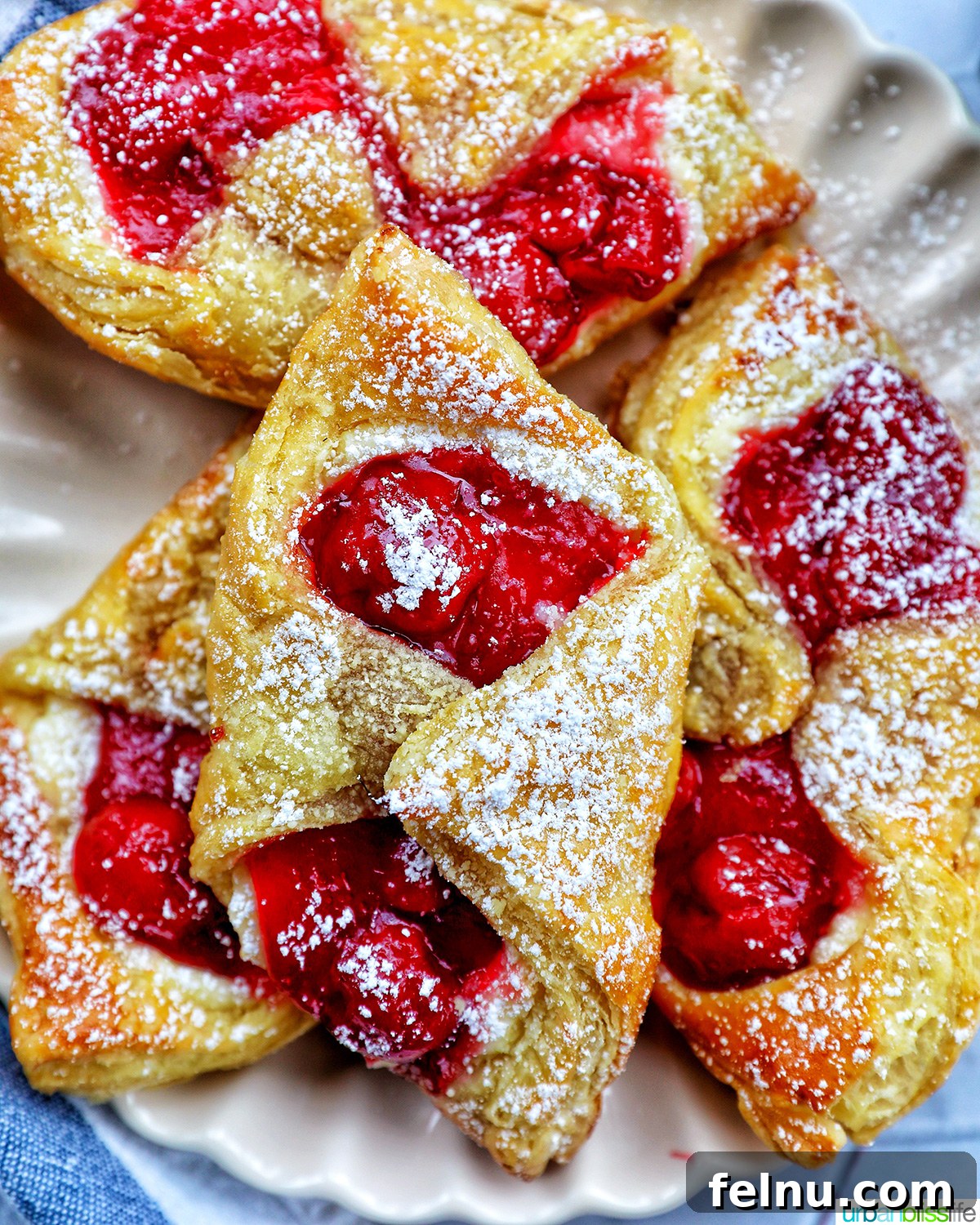 Cherry Delight Pastry 2 Cherry Danish pastries on a plate
