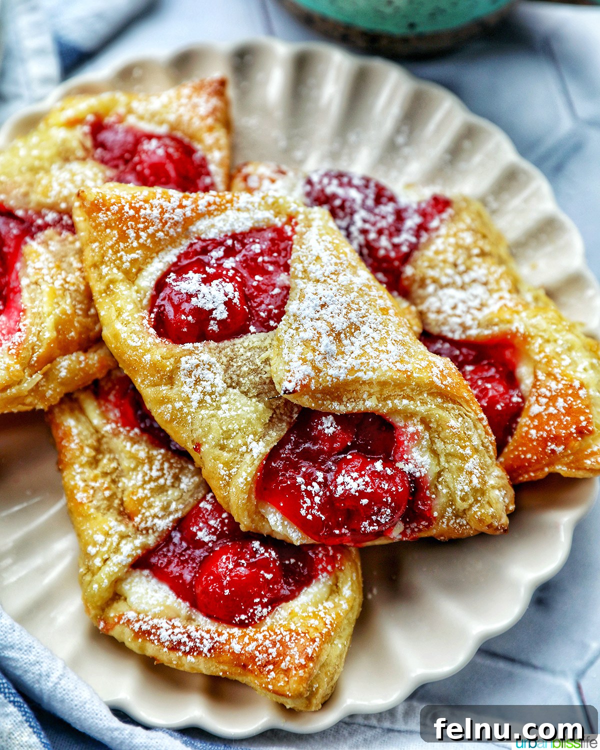 Cherry Delight Pastry 14 Cherry Danish pastries on a plate