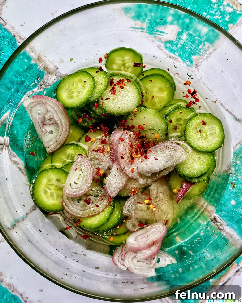 Spicy Asian Cucumber Pickles 6 Asian pickled cucumbers in a bowl.