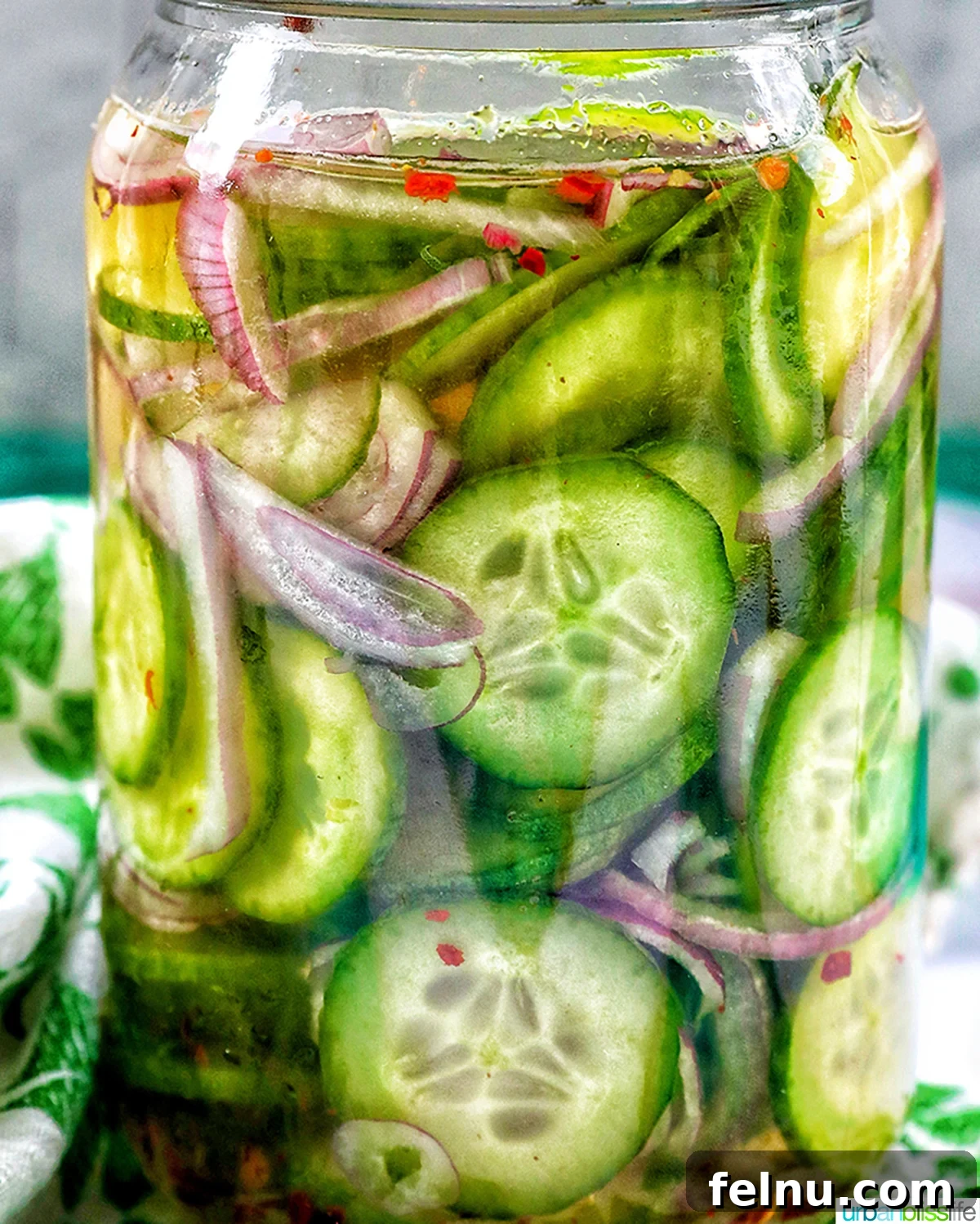 Spicy Asian Cucumber Pickles 8 closeup of a jar of Asian pickled cucumbers.