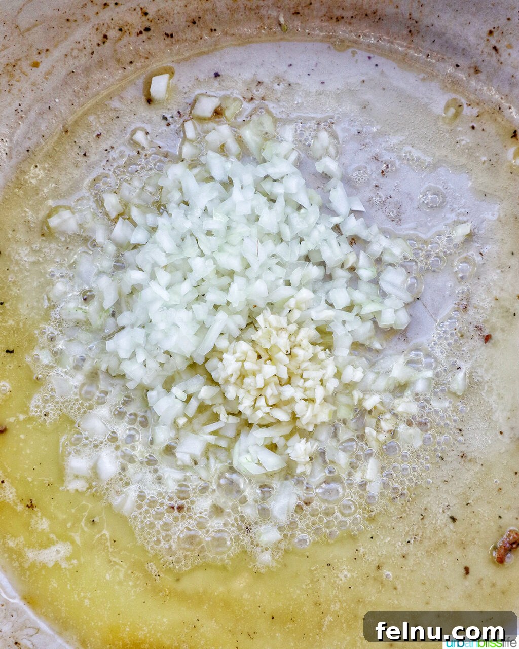 Garlic Parmesan Chicken Pasta
Scrumptious Garlic Parmesan Chicken Pasta 9 Sauteing Onions and Garlic