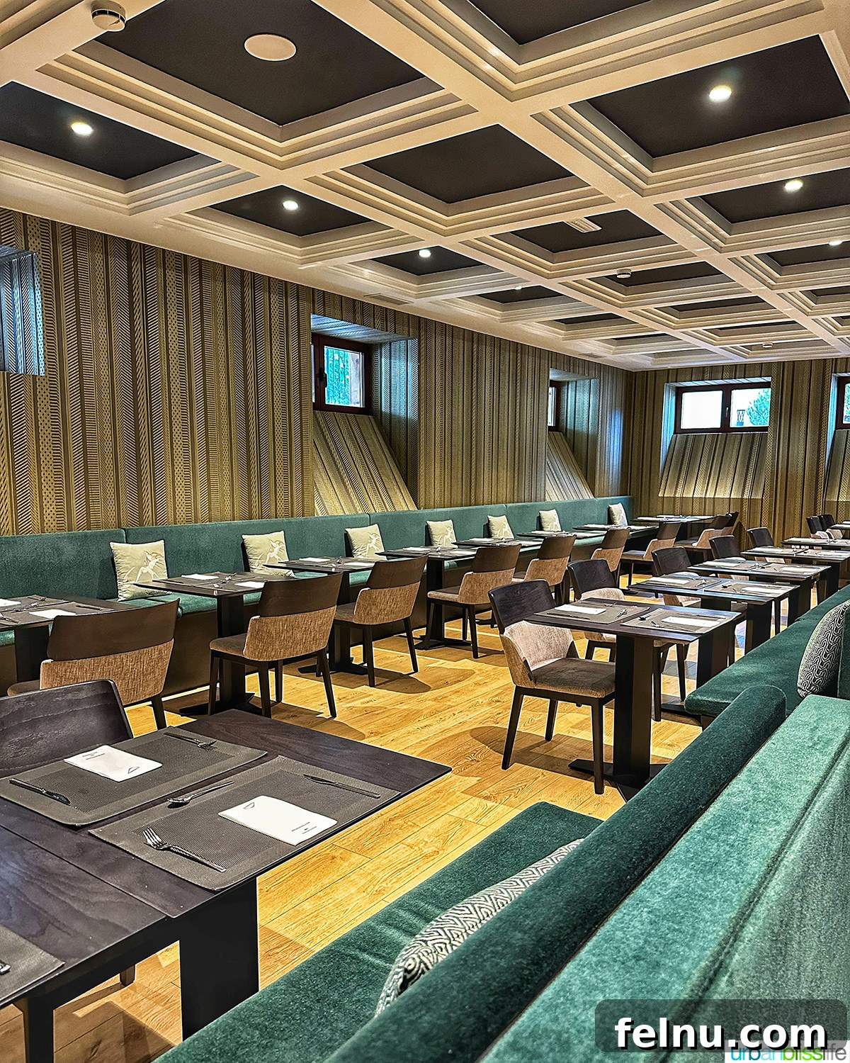 The inviting interior of the 4th Gastrobar at Hotel Abba San Sebastian, featuring modern decor and comfortable dining tables.