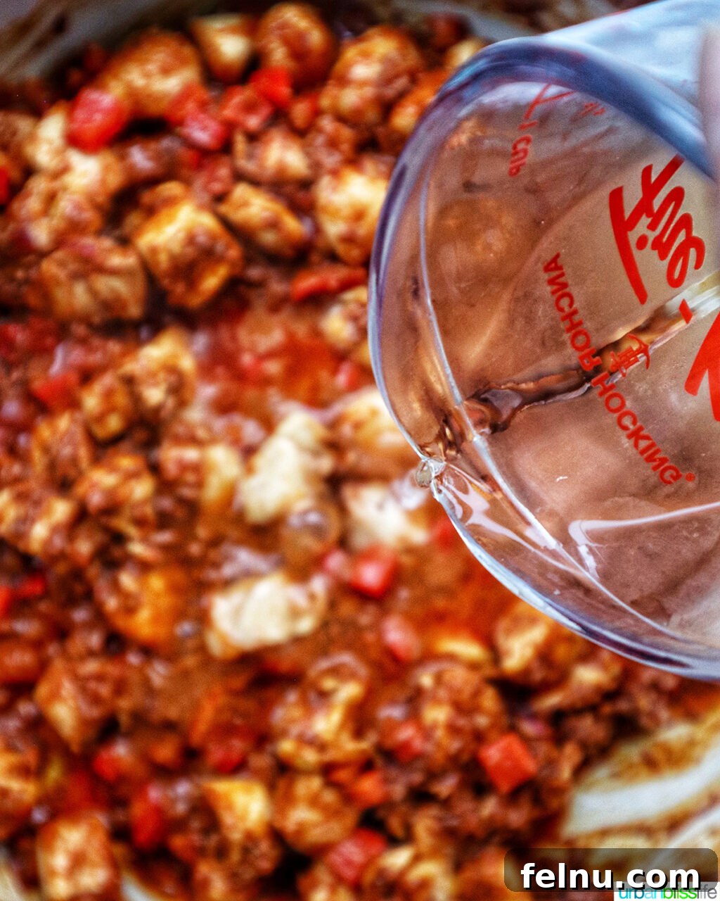 Chorizo Chicken Pasta
Sizzling Chorizo Chicken Pasta 12 Pouring wine into chorizo chicken pasta.