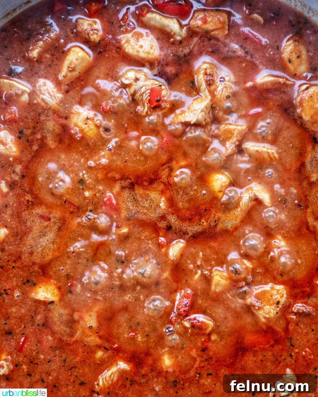 Chorizo Chicken Pasta
Sizzling Chorizo Chicken Pasta 14 Chorizo chicken pasta cooking in a pan.