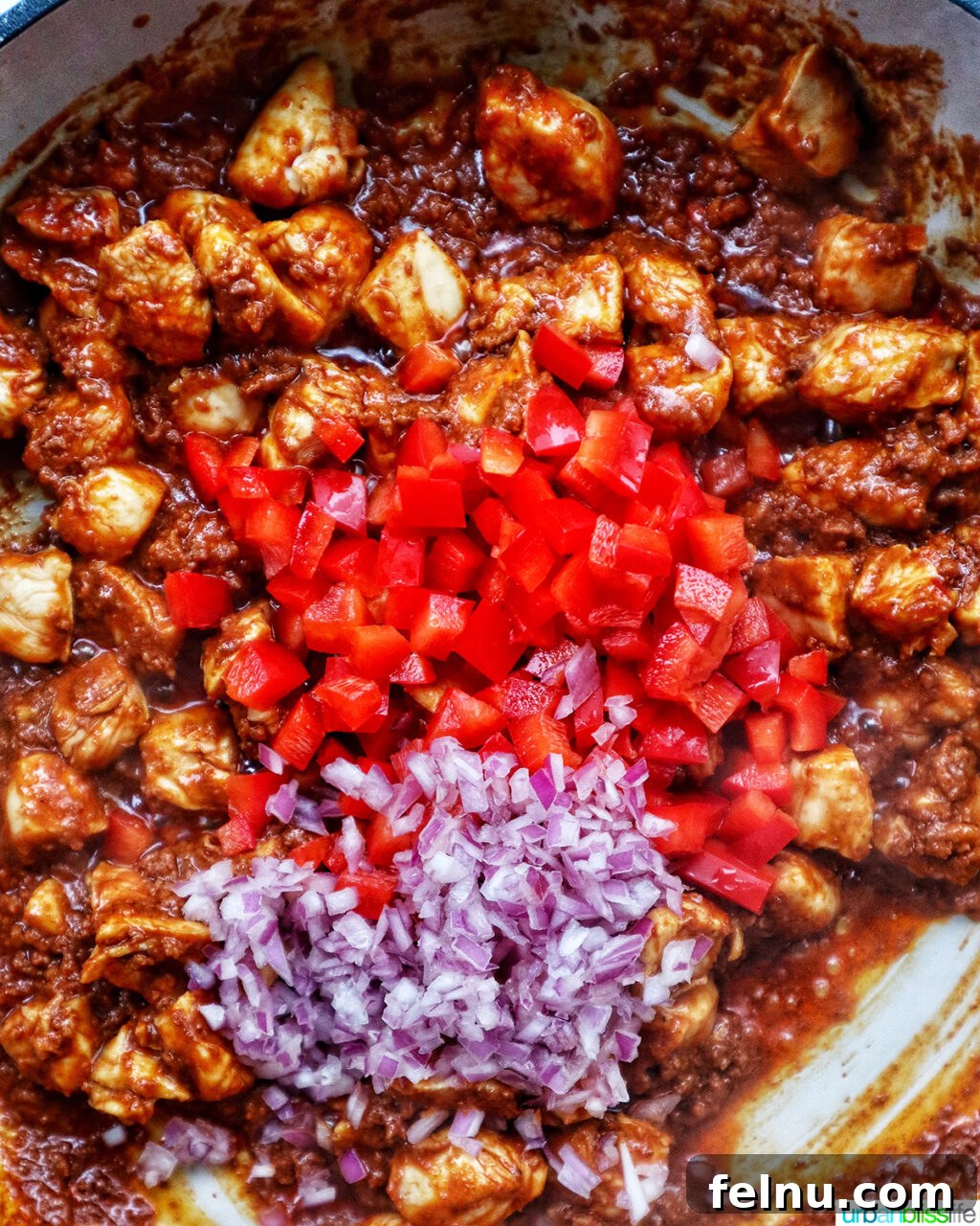 Chorizo Chicken Pasta
Sizzling Chorizo Chicken Pasta 9 Adding red onions and red pepper to the chicken and chorizo.