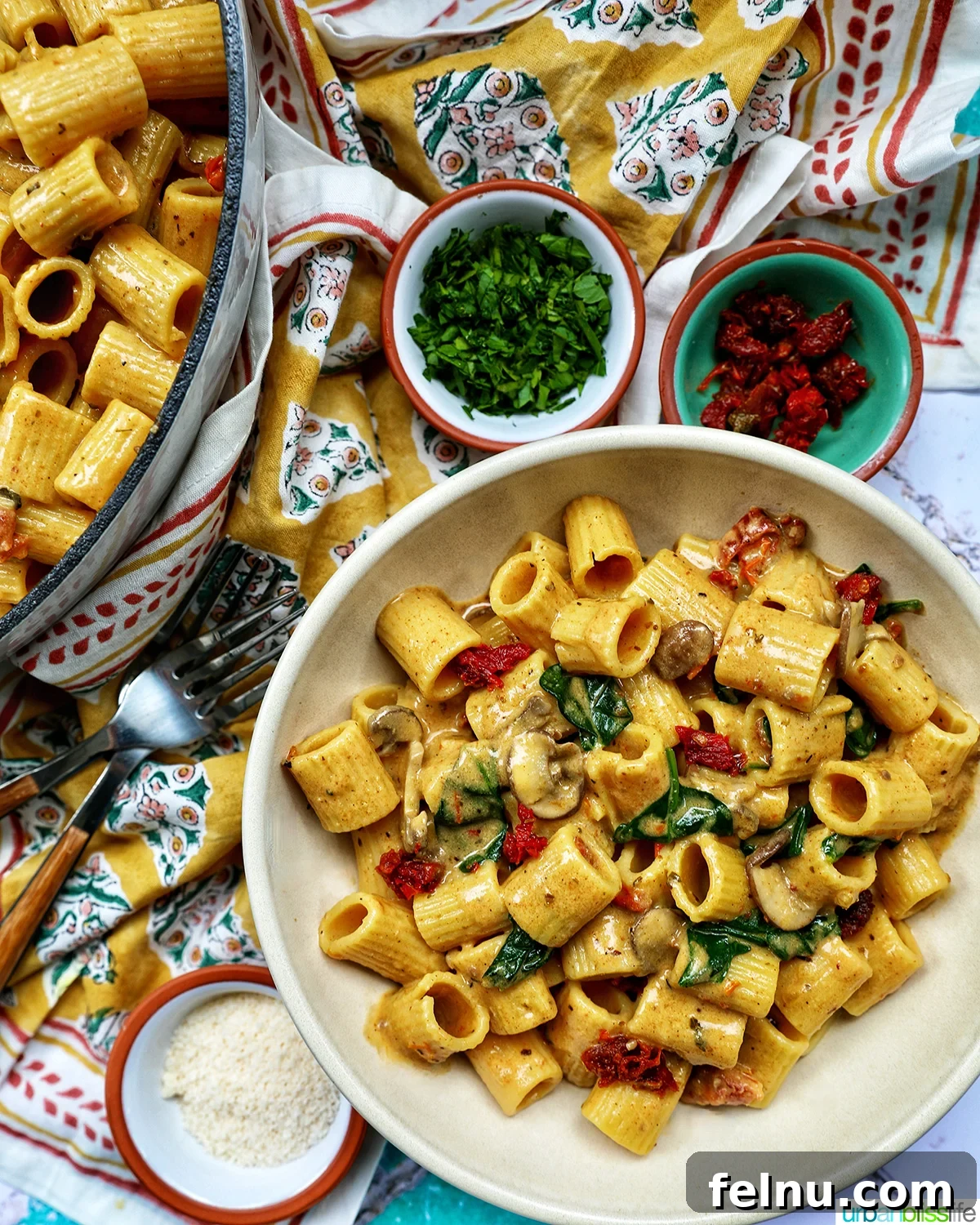 The Proposal Pasta 2 Two bowls of vegetarian Marry Me Pasta, viewed from above, garnished with fresh parsley.
