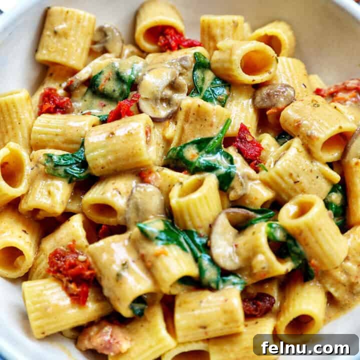 A delicious bowl of Marry Me Pasta, showcasing its creamy texture and vibrant garnishes.