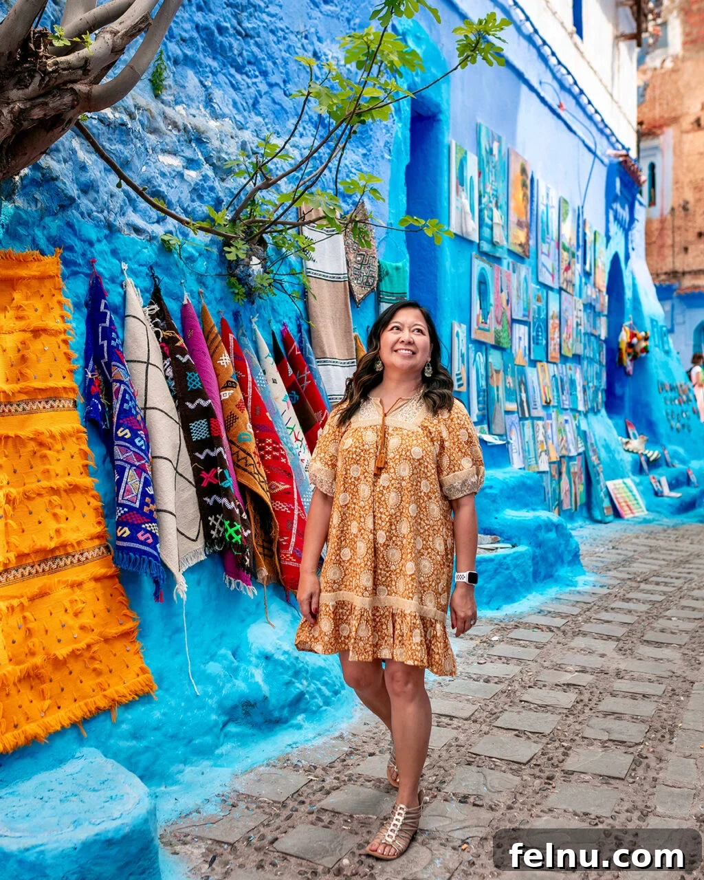 Morocco Unveiled: A 10-Day Journey from Coast to Desert 27 A person in Chefchaouen, the blue city, Morocco.