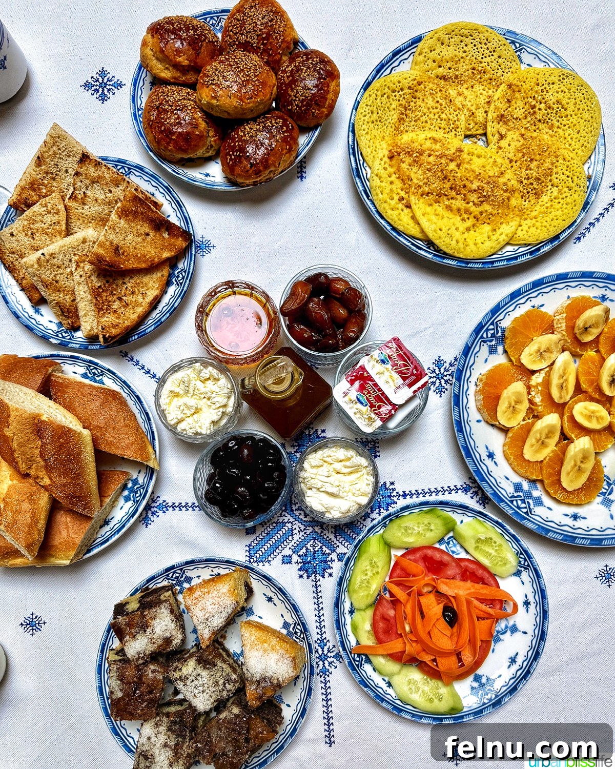 Morocco Unveiled: A 10-Day Journey from Coast to Desert 33 A breakfast table full of fresh Moroccan food at Riad Salam Fes in Fes, Morocco.