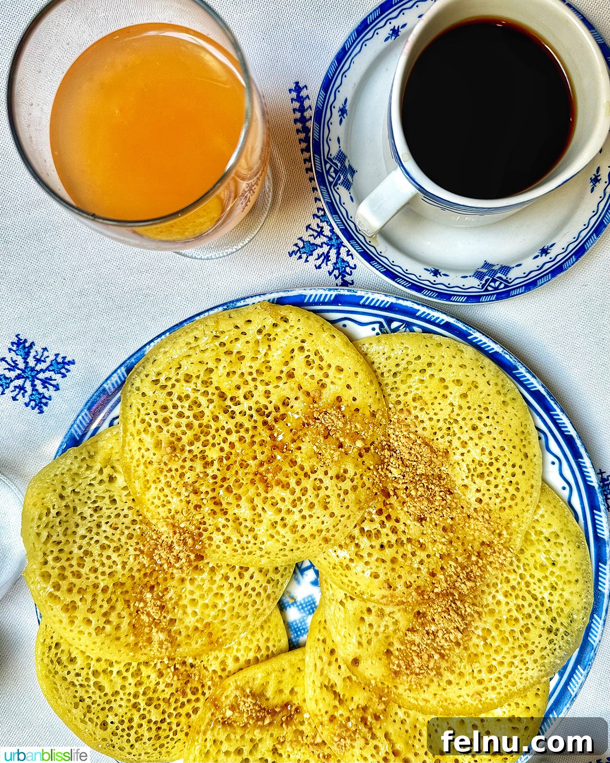 Authentic Moroccan Cuisine 11 Moroccan Baghrir pancakes served with juice and coffee.