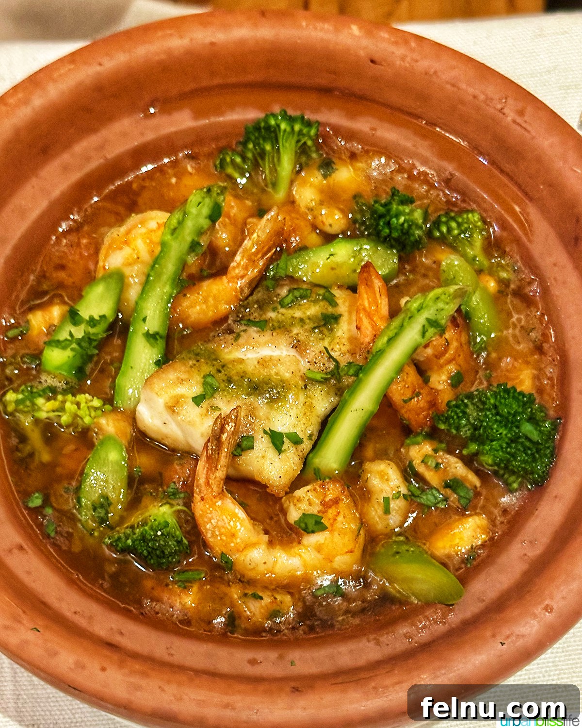 Authentic Moroccan Cuisine 16 A bubbling Tagine Al Hout seafood tagine.