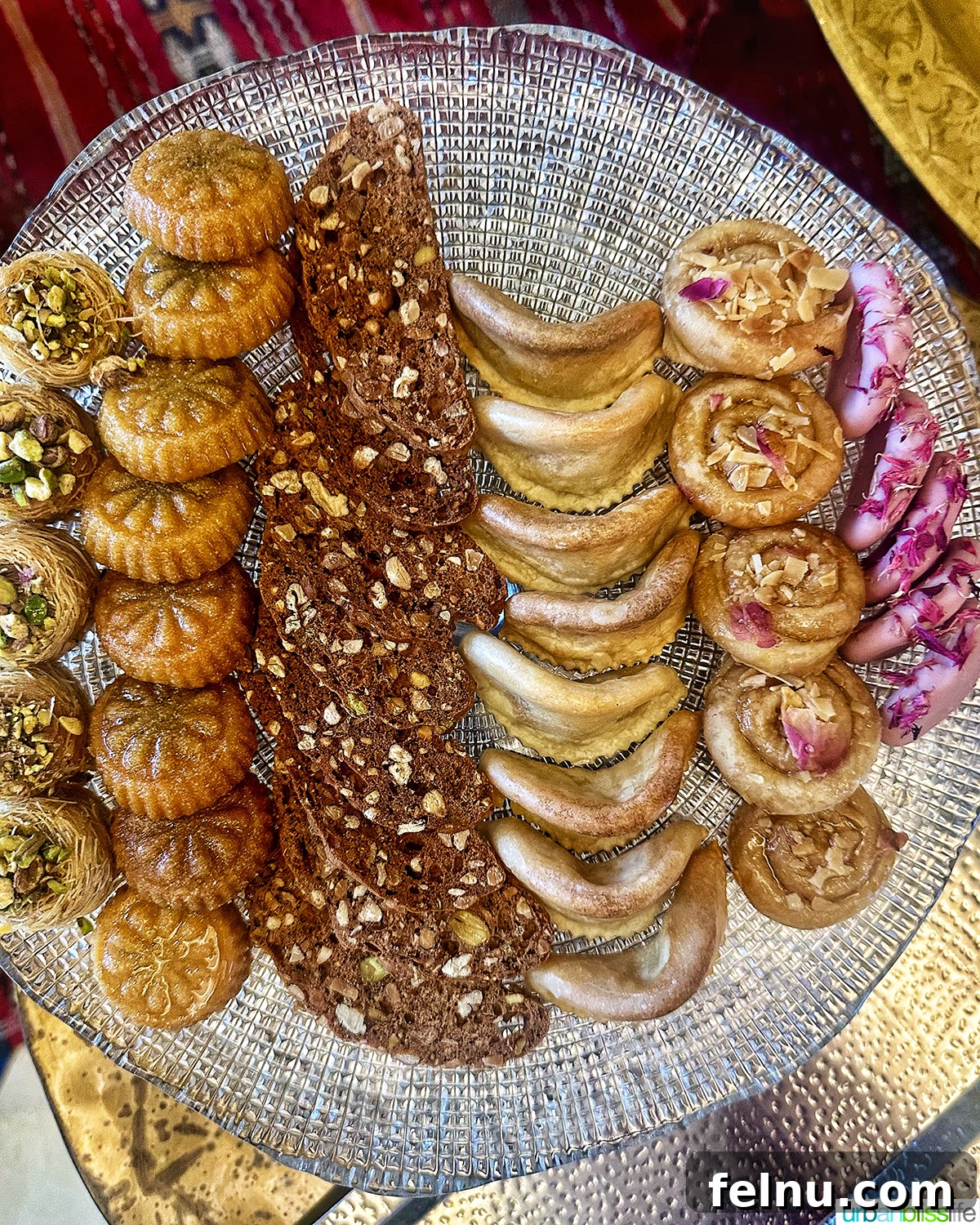 Authentic Moroccan Cuisine 20 An assortment of Moroccan pastries, including Kaab el Gazelle.