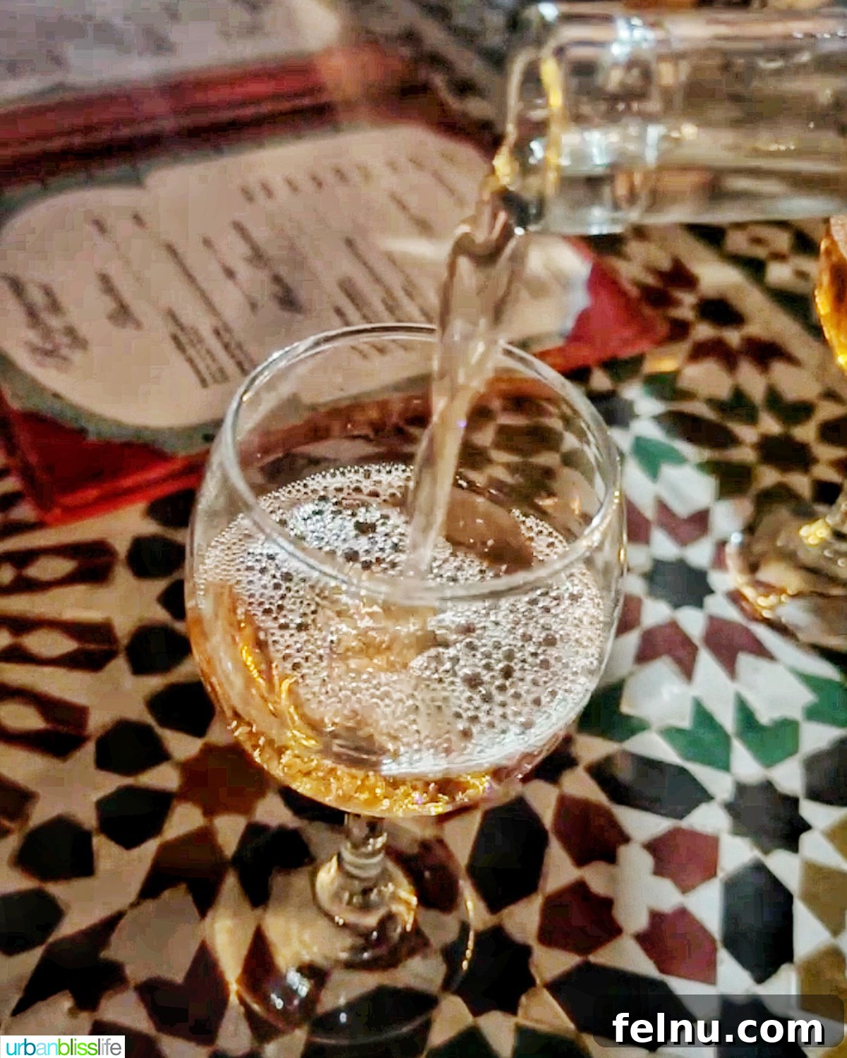 Authentic Moroccan Cuisine 21 A glass of Moroccan rosé wine being poured.