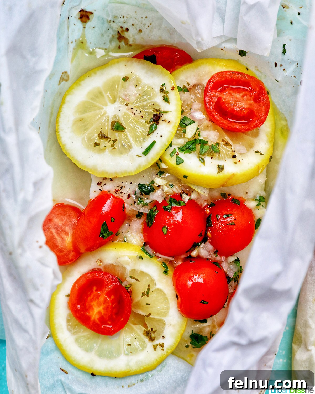 Flaky Cod En Papillote 3 A perfectly cooked Cod en Papillote, ready to be served.