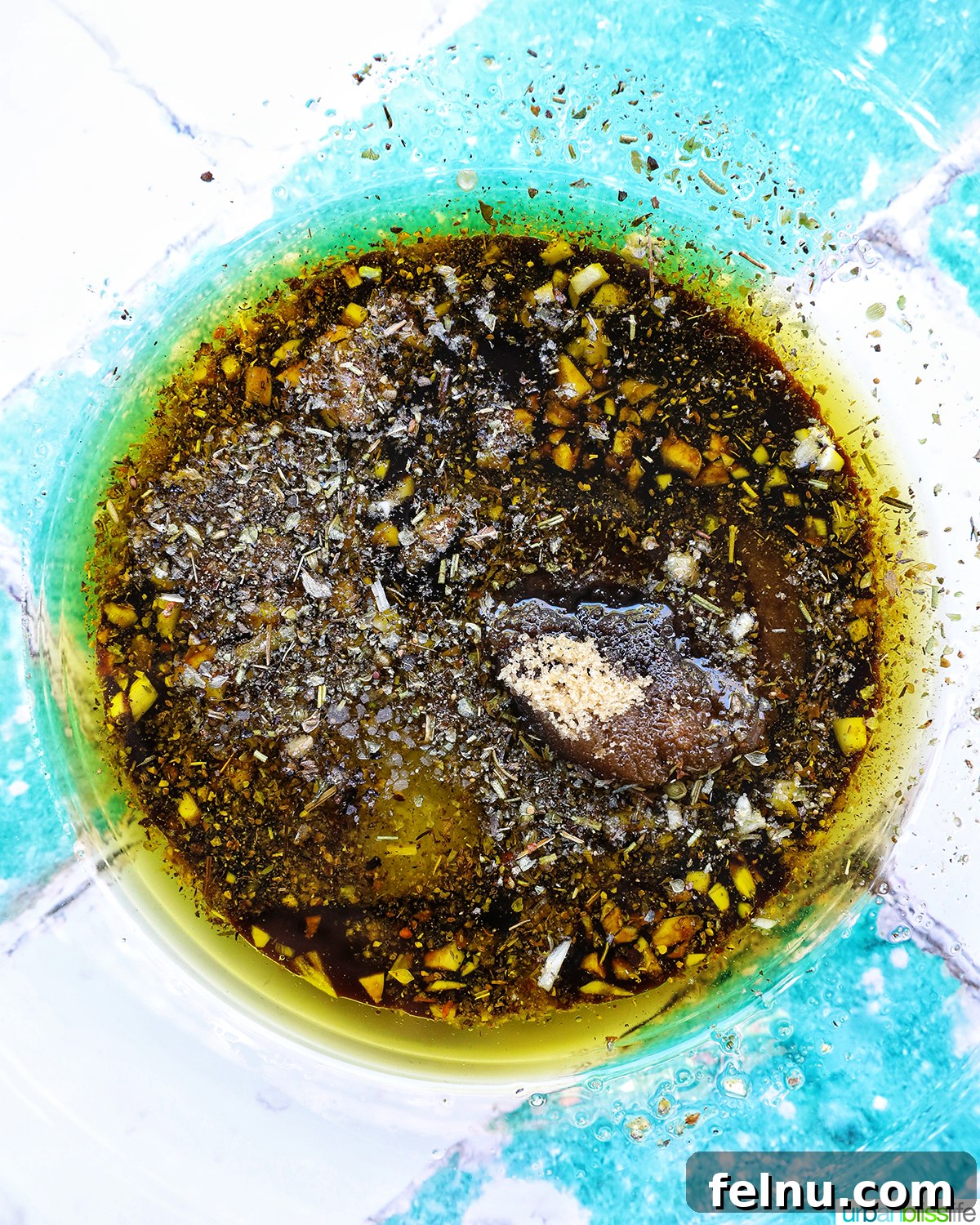 Tangy Balsamic Chicken Greens 5 A small bowl of homemade balsamic dressing, perfectly emulsified and ready to use.