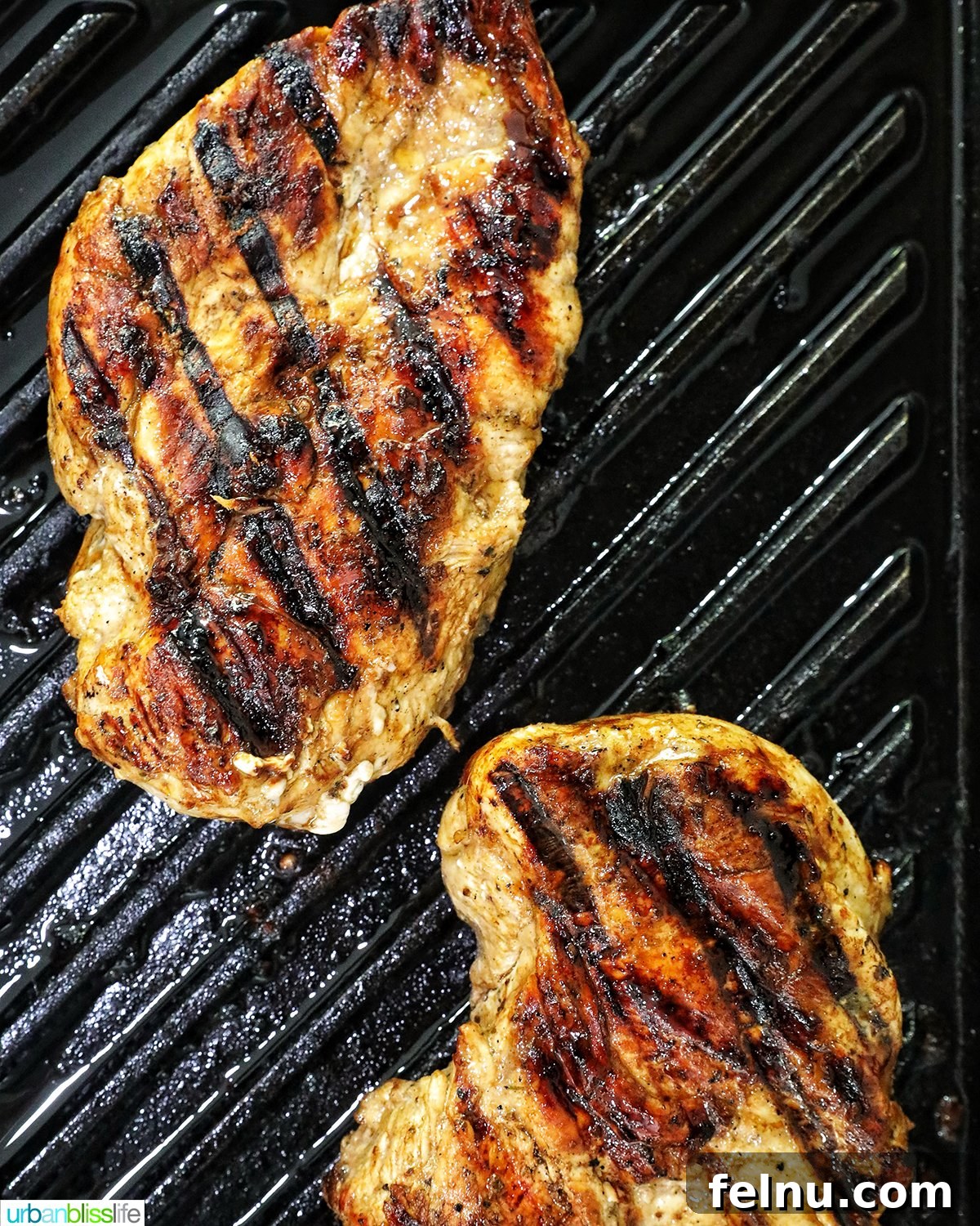 Tangy Balsamic Chicken Greens 8 Another shot of chicken grilling on a pan, illustrating the cooking process.