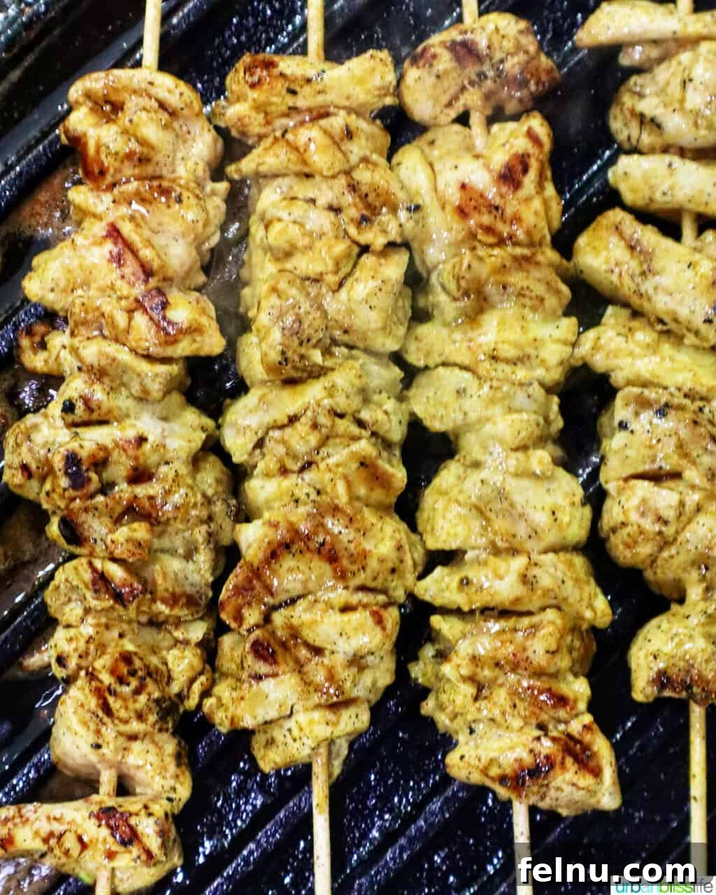 Tandoori Chicken Kebabs 13 Grilling tandoori chicken skewers.