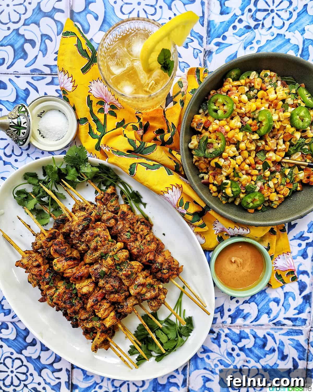 Tandoori Chicken Kebabs 15 Tandoori chicken skewers with charred corn salad and bourbon lemonade.
