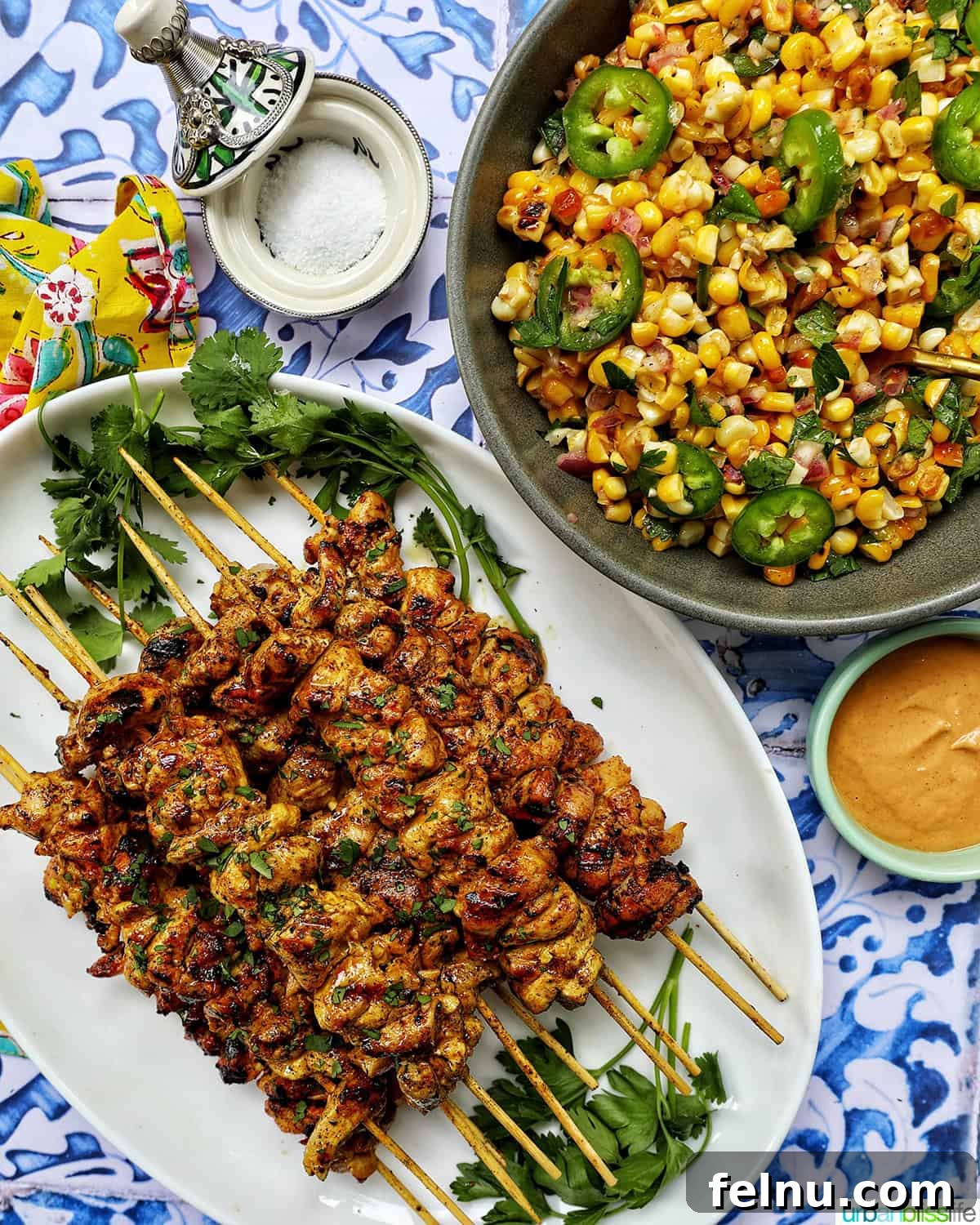 Tandoori Chicken Kebabs 16 Tandoori chicken skewers with charred corn salad and bourbon lemonade.