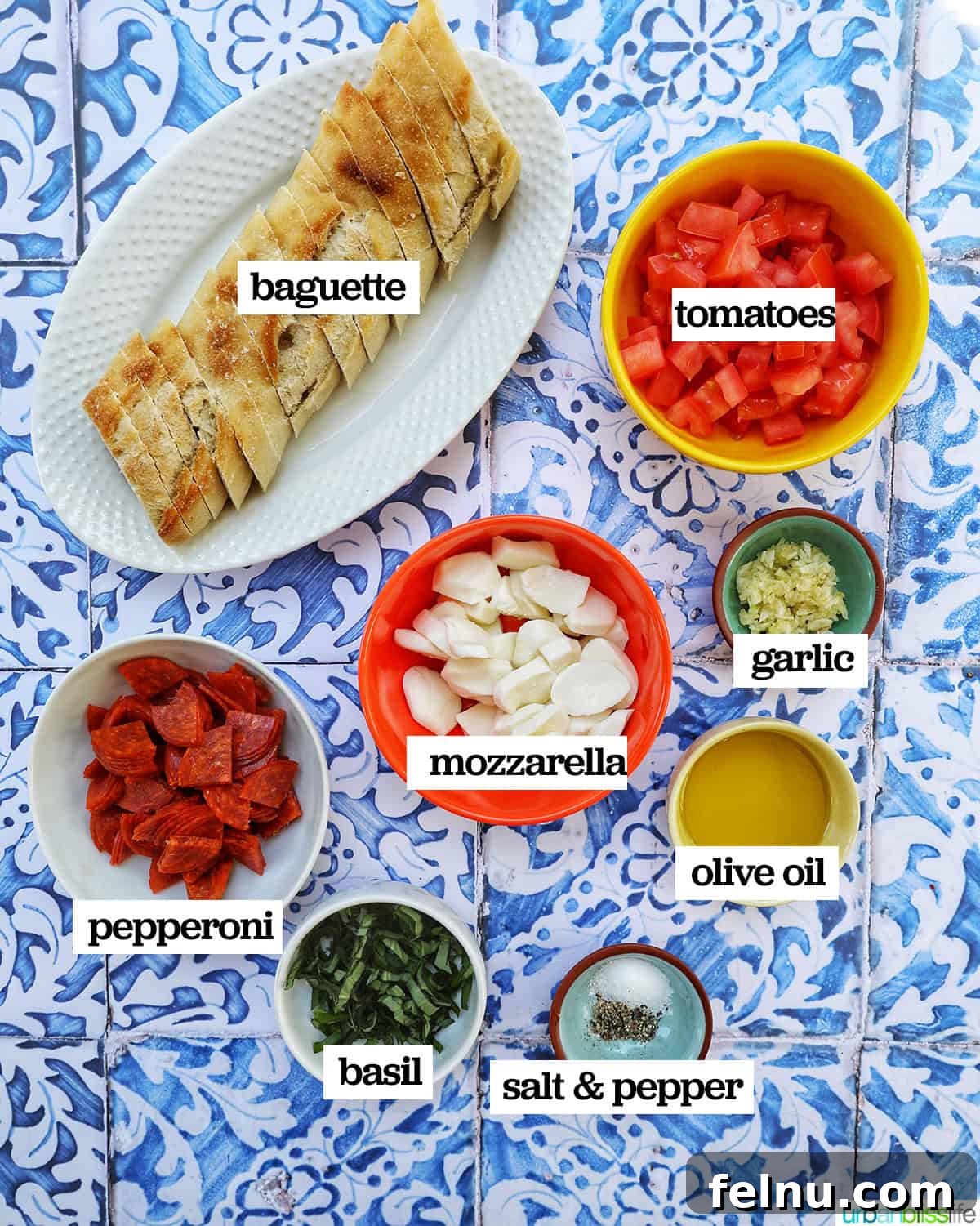 All the fresh ingredients needed to make delicious crostini pizza.