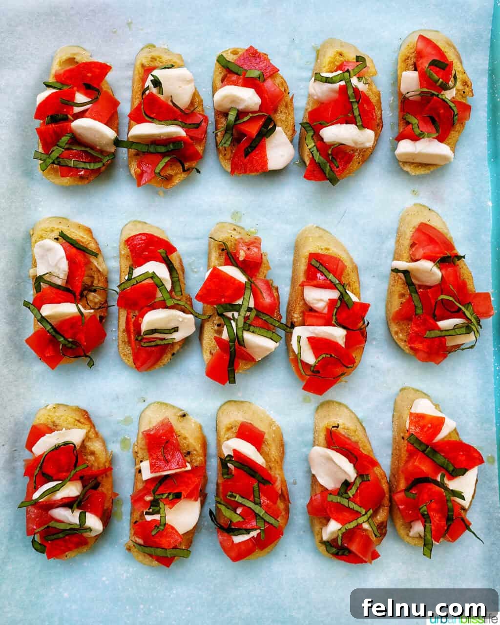 Delicious slices of homemade crostini pizza on a baking sheet, ready to serve.