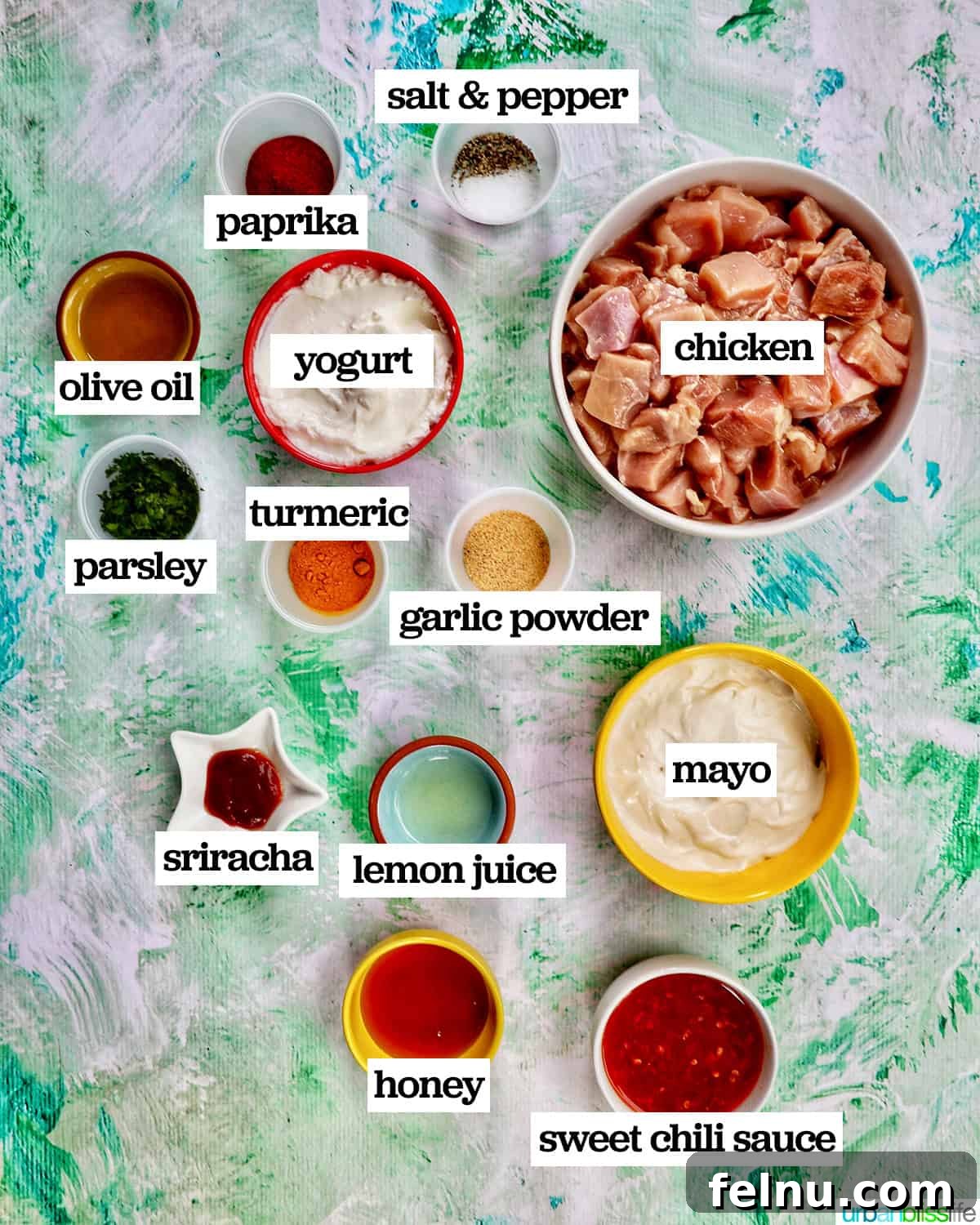Spicy Peanut Glazed Chicken Skewers 4 A flat lay of all the fresh ingredients needed to prepare delicious Bang Bang Chicken Skewers, neatly arranged on a counter.