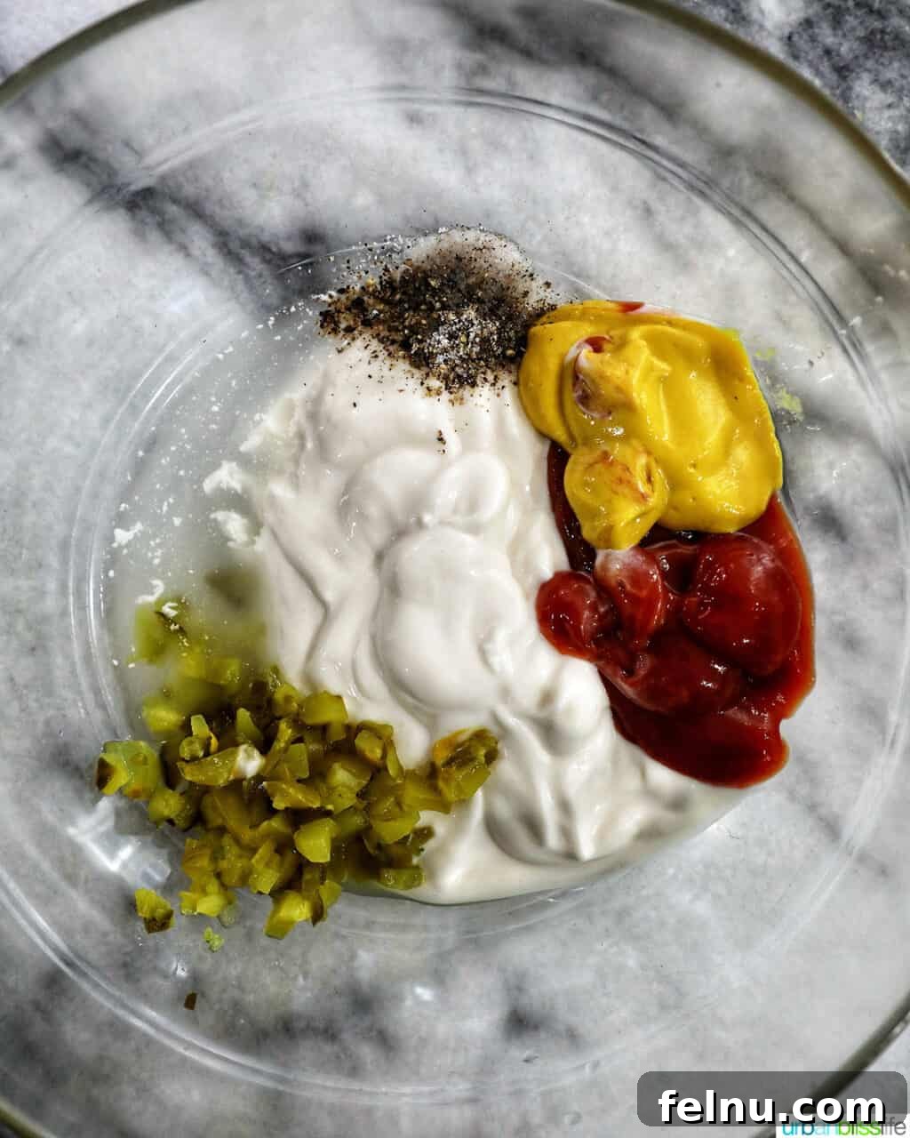 Big Mac Burger Bowl 7 Ingredients for Big Mac sauce being combined in a bowl.