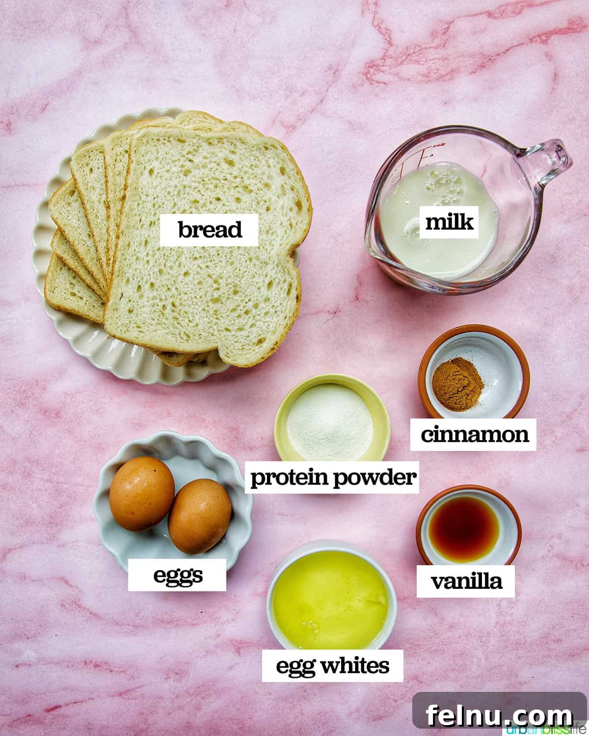 Power-Packed Protein French Toast 4 a visual display of ingredients laid out to make high protein french toast, including bread, eggs, milk, and protein powder.