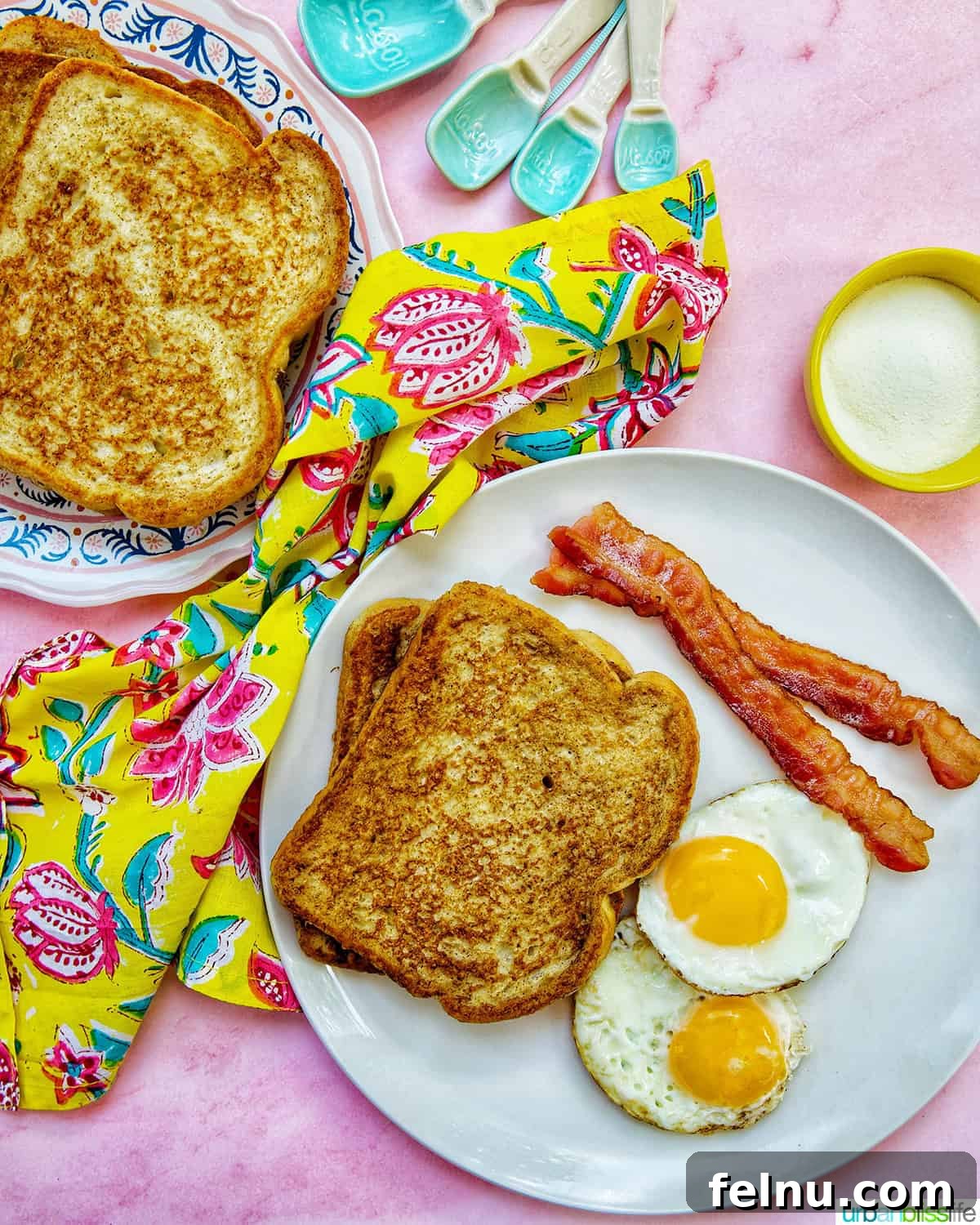 Power-Packed Protein French Toast 10 high protein french toast served with crispy bacon and sunny-side-up eggs.