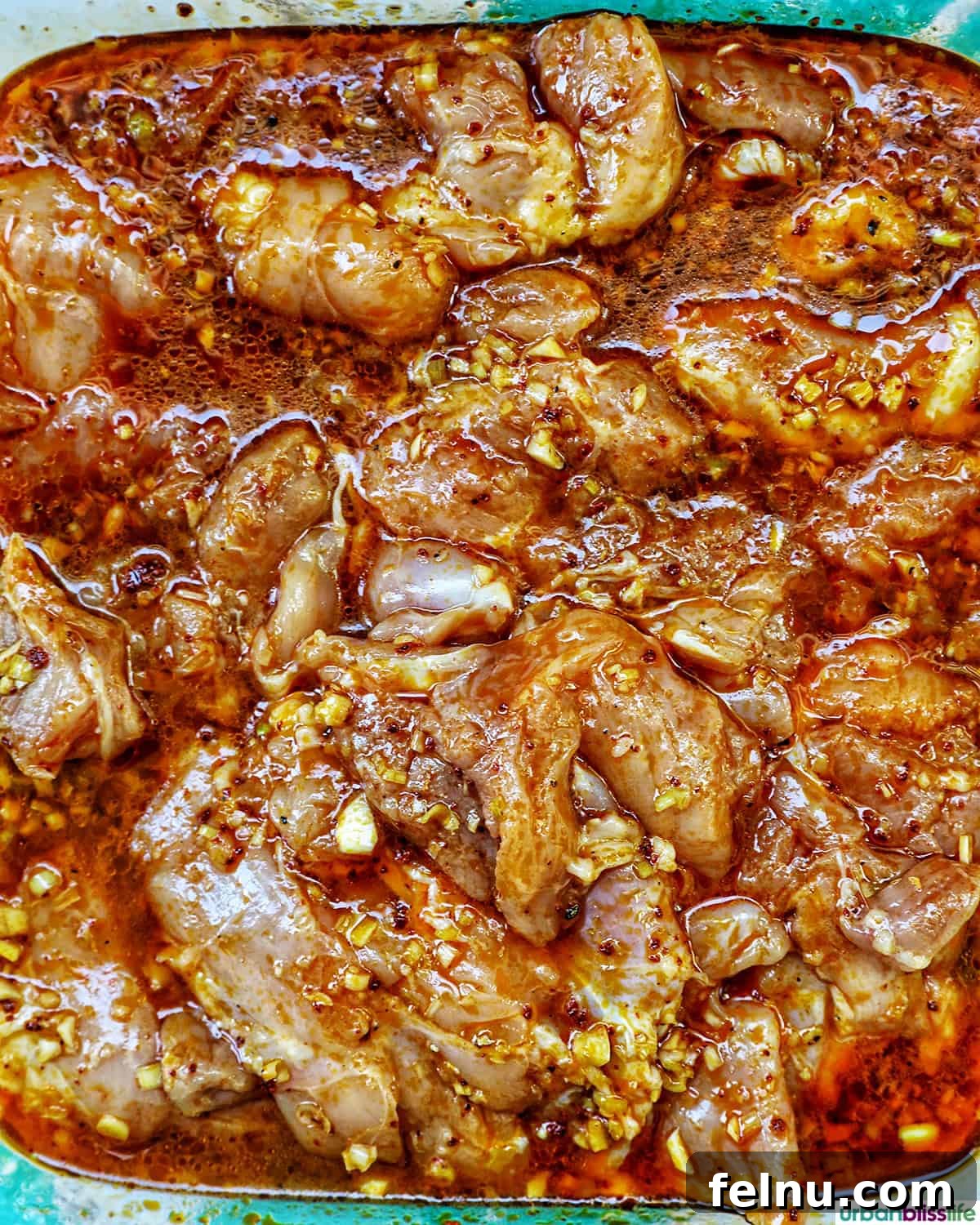 Chicken Inasal 7 Chicken marinating in inasal marinade.