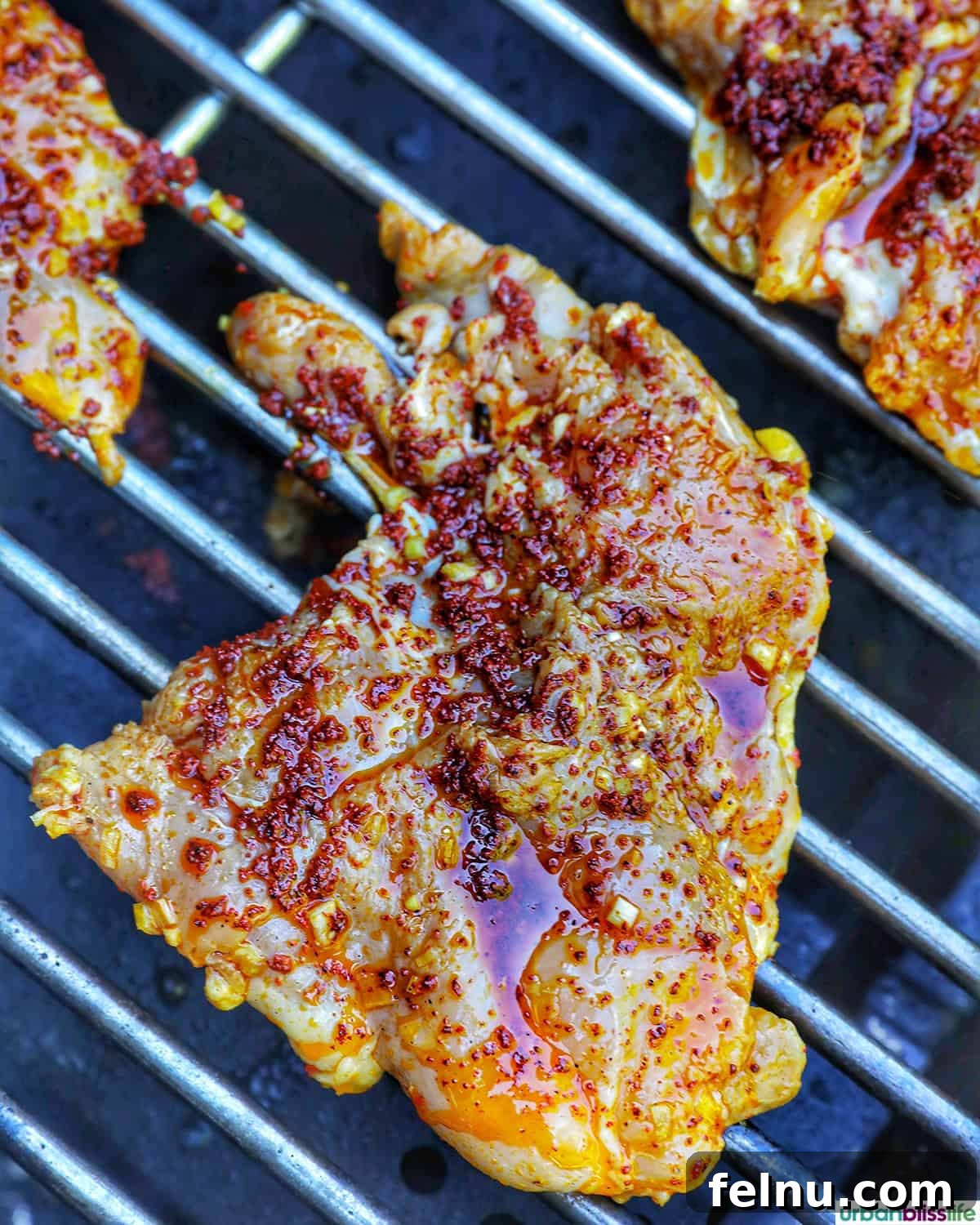 Chicken Inasal 8 Marinated chicken inasal on a grill.