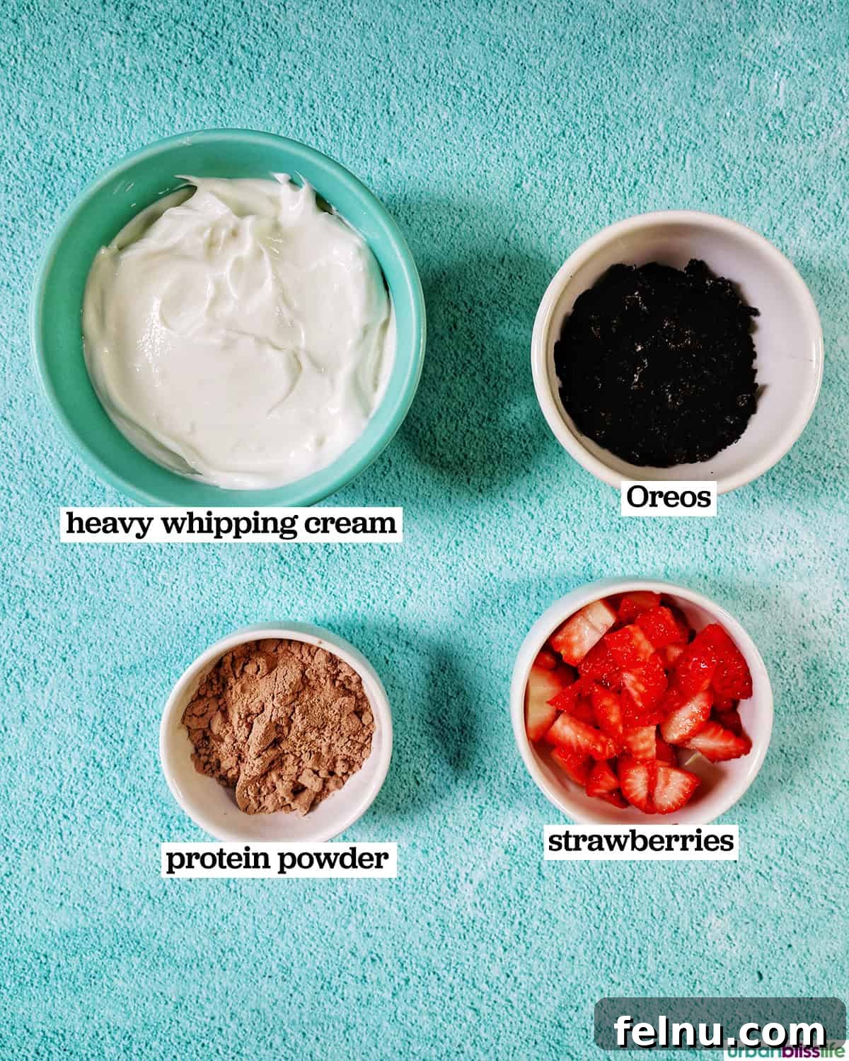 High-Protein Chocolate Dream Parfait 4 Bowls of ingredients to make a high protein chocolate parfait.