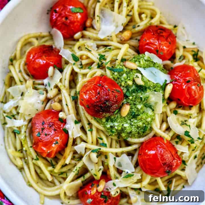 Vibrant Cherry Tomato Pesto Pasta 13 cherry tomato and pesto pasta in a bowl.