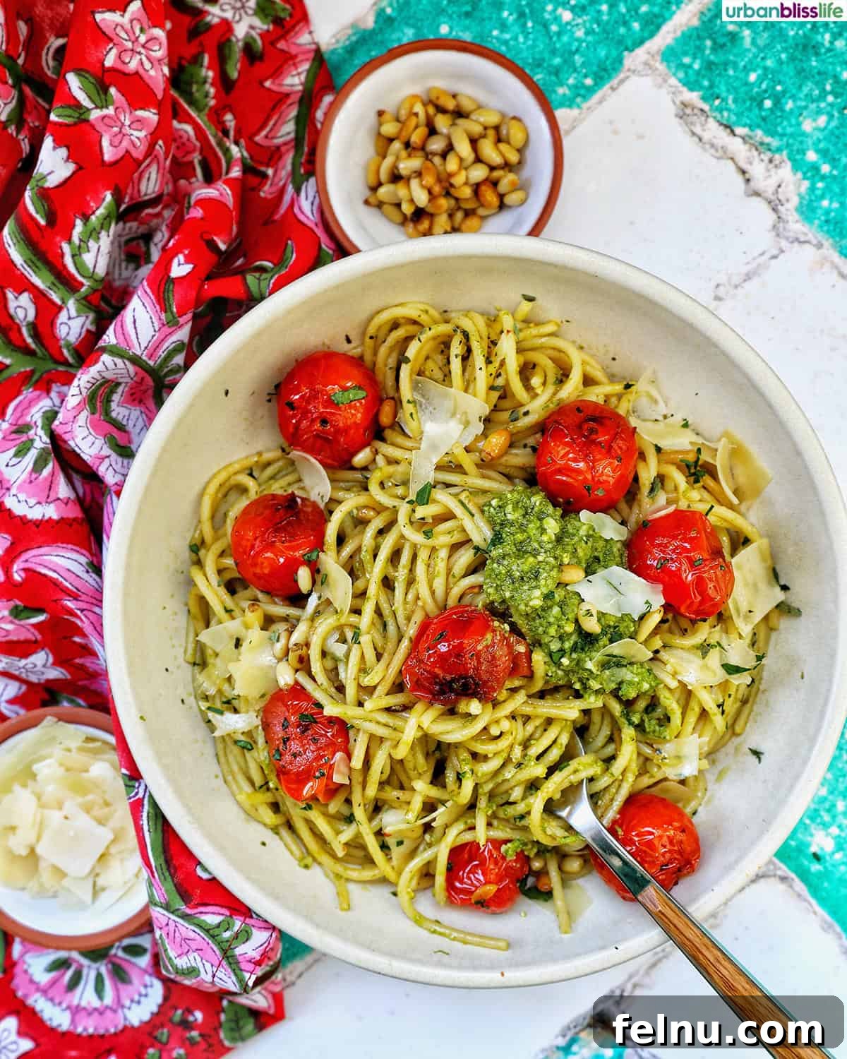 Vibrant Cherry Tomato Pesto Pasta 3 bowl of cherry tomato and pesto pasta and bowls of pine nuts and cheese.