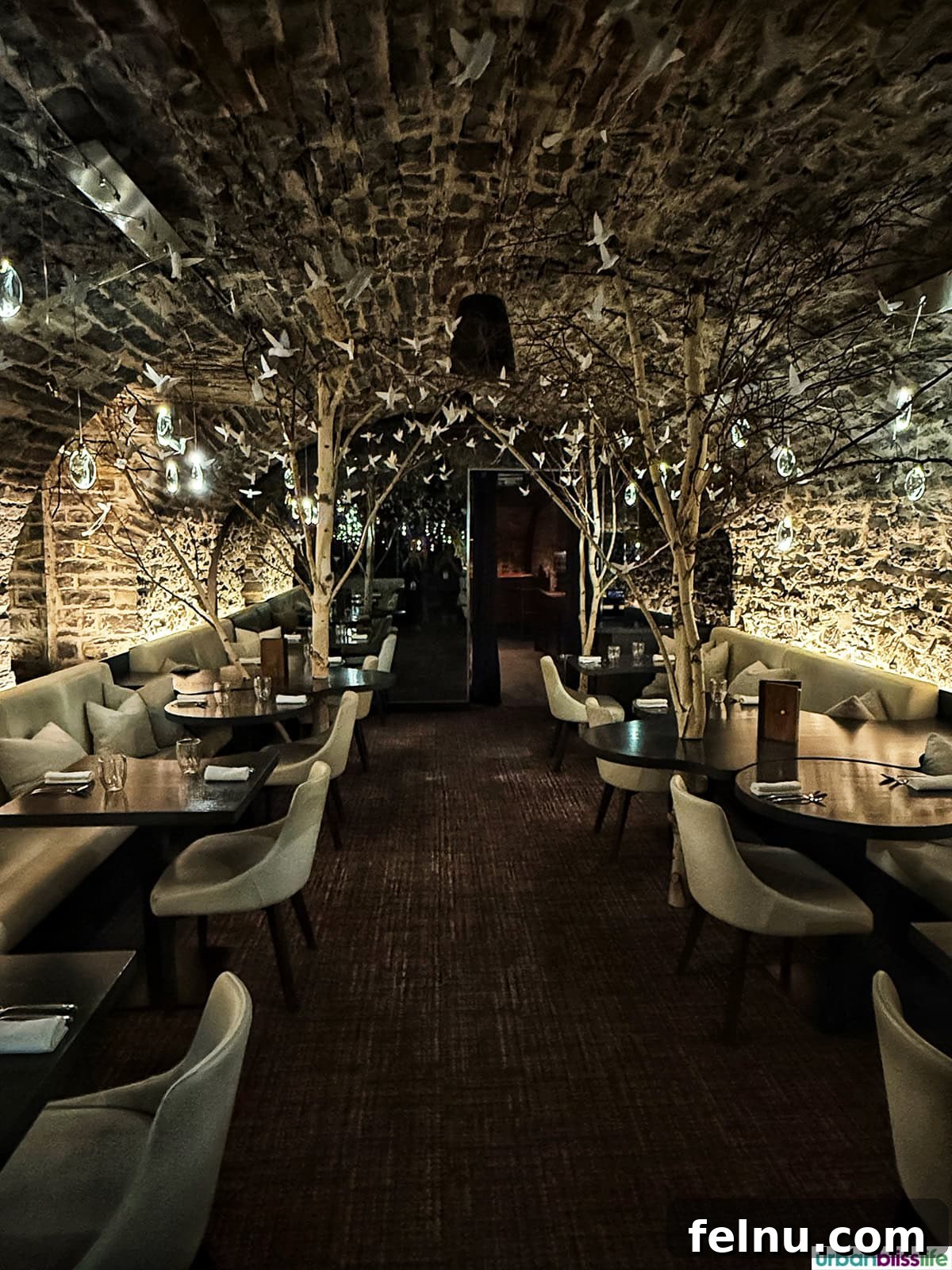 A Taste of Quebec: Culinary Hotspots in the City 20 The dimly lit and atmospheric dining room at Restaurant Taniere 3, creating an intimate and memorable experience.