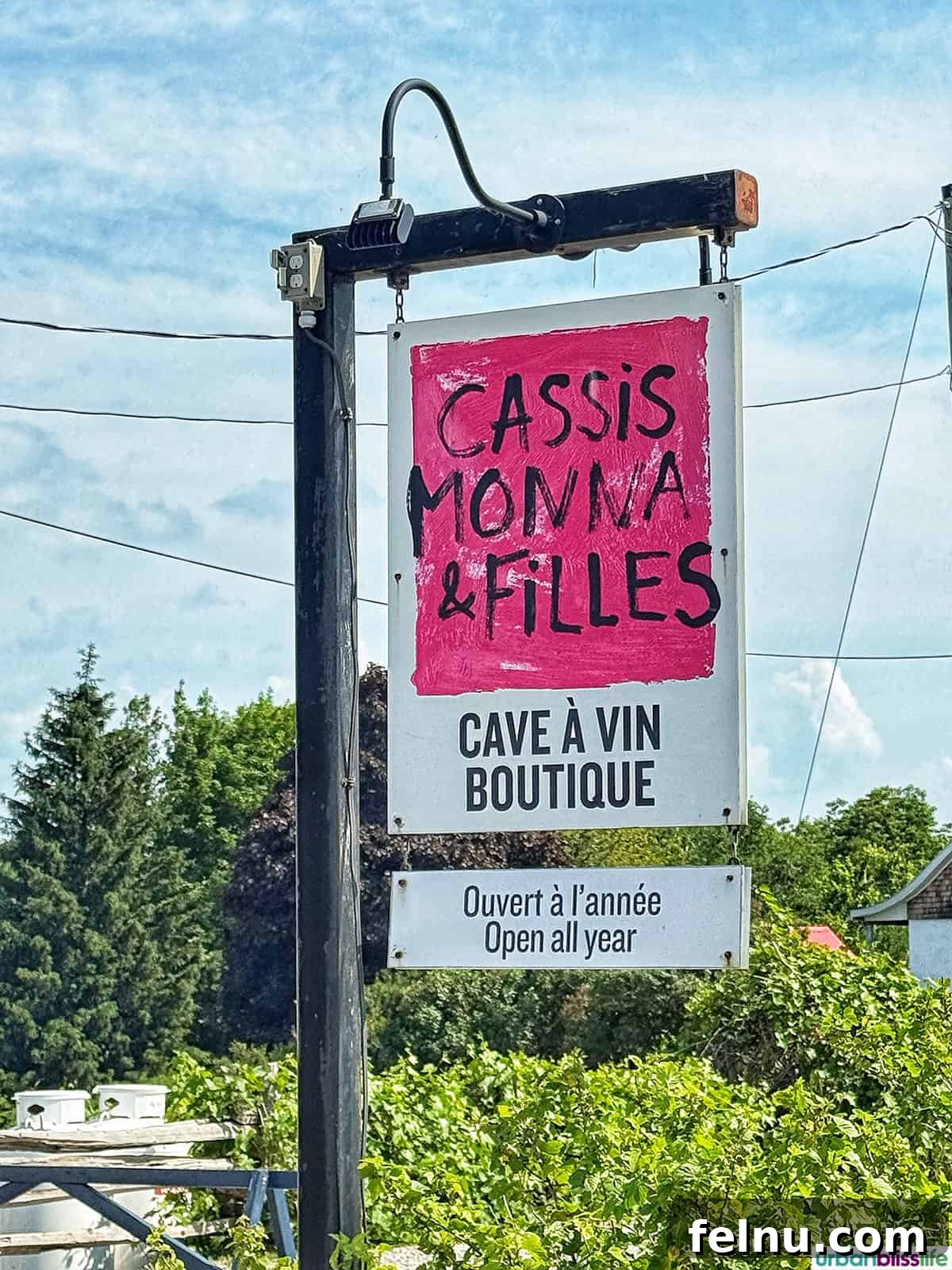 A Taste of Quebec: Culinary Hotspots in the City 5 The welcoming sign for Cassis Monna & Filles, inviting visitors to explore the world of black currants.