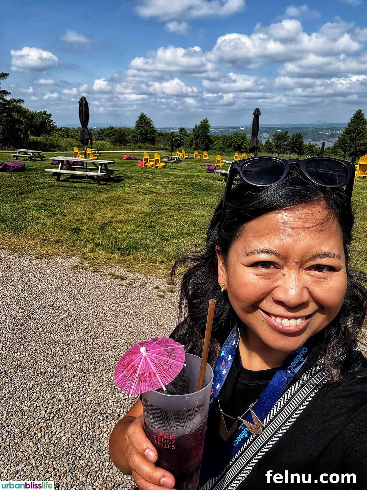 A Taste of Quebec: Culinary Hotspots in the City 6 Marlynn Jayme Schotland enjoys a cocktail amidst the lush greenery of Île d'Orléans at Cassis Monna & Filles.