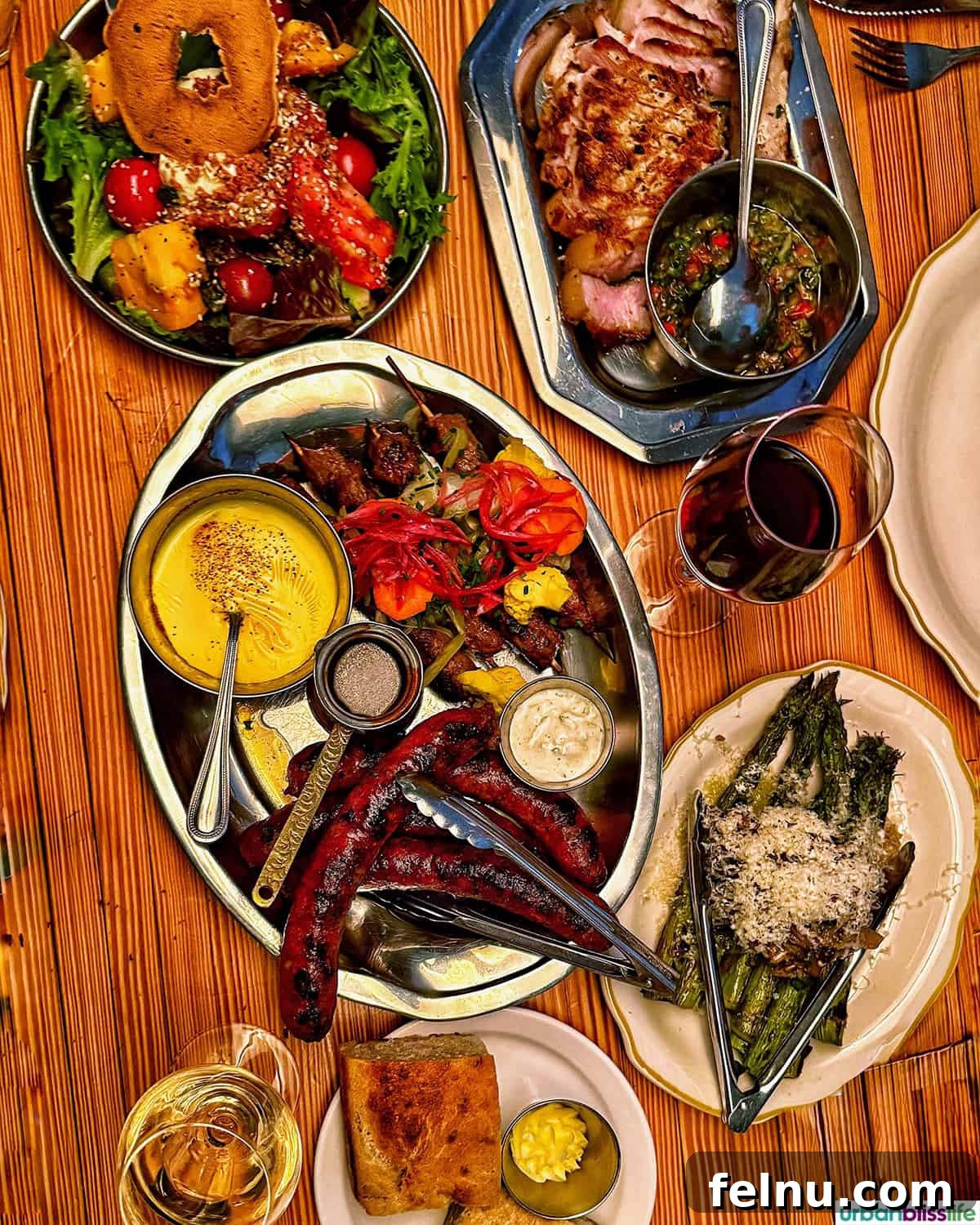 Montreal's Culinary Hotspots 14 Platters of vibrant and flavorful food on a wood table at Papito, showcasing the restaurant's modern Latin cuisine.