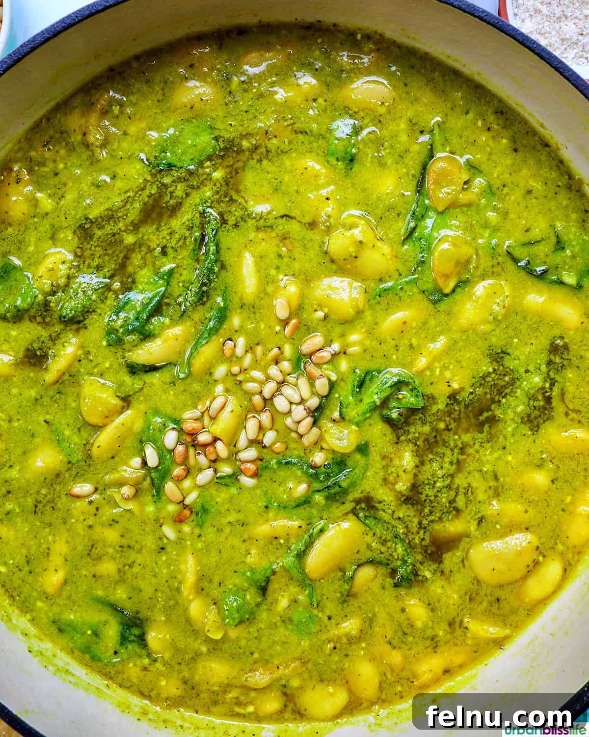 pesto beans in a large pan.