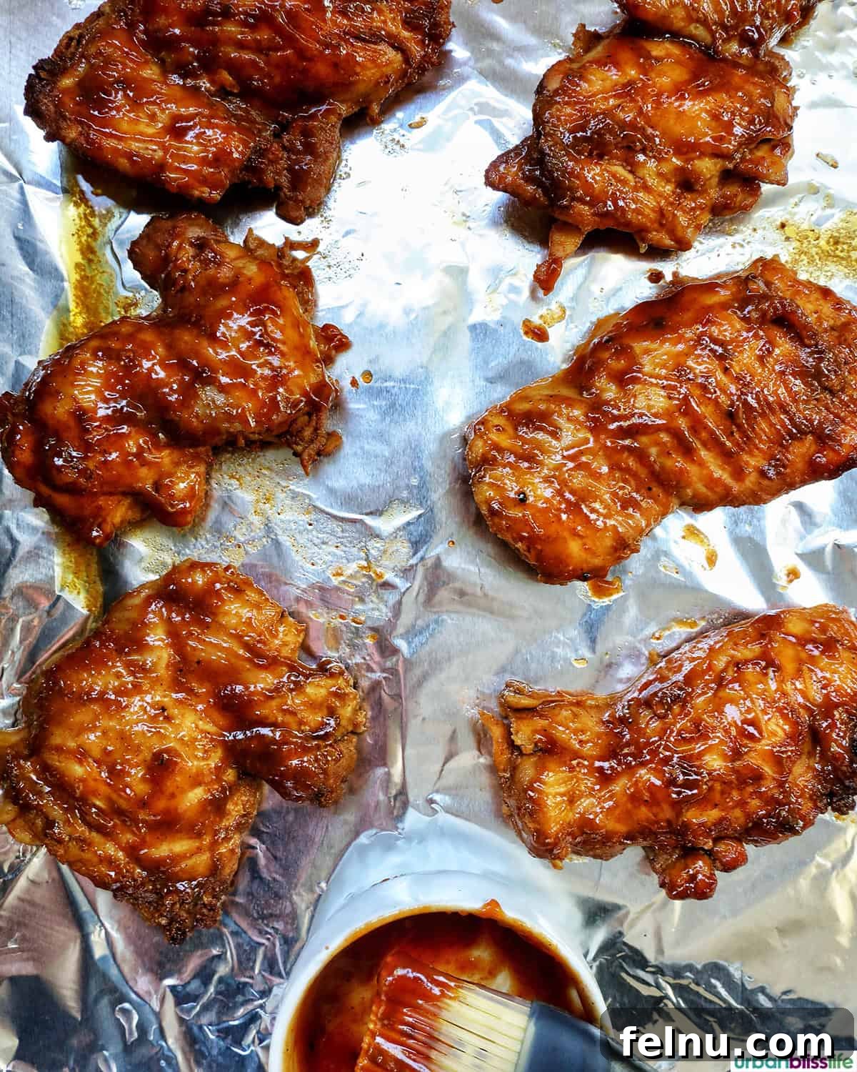 Slow Cooker BBQ Chicken Thighs
Tender & Tangy BBQ Chicken Thighs: Slow Cooker Perfection 14 Broiled barbecue chicken on aluminum foil