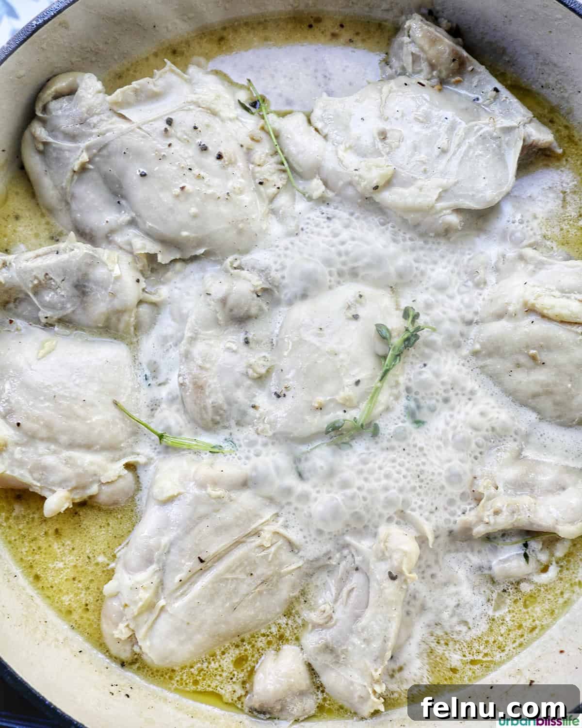 Rich Brandy Peppercorn Chicken 12 Partially cooked chicken returned to the simmering peppercorn sauce in the pan, absorbing flavors.